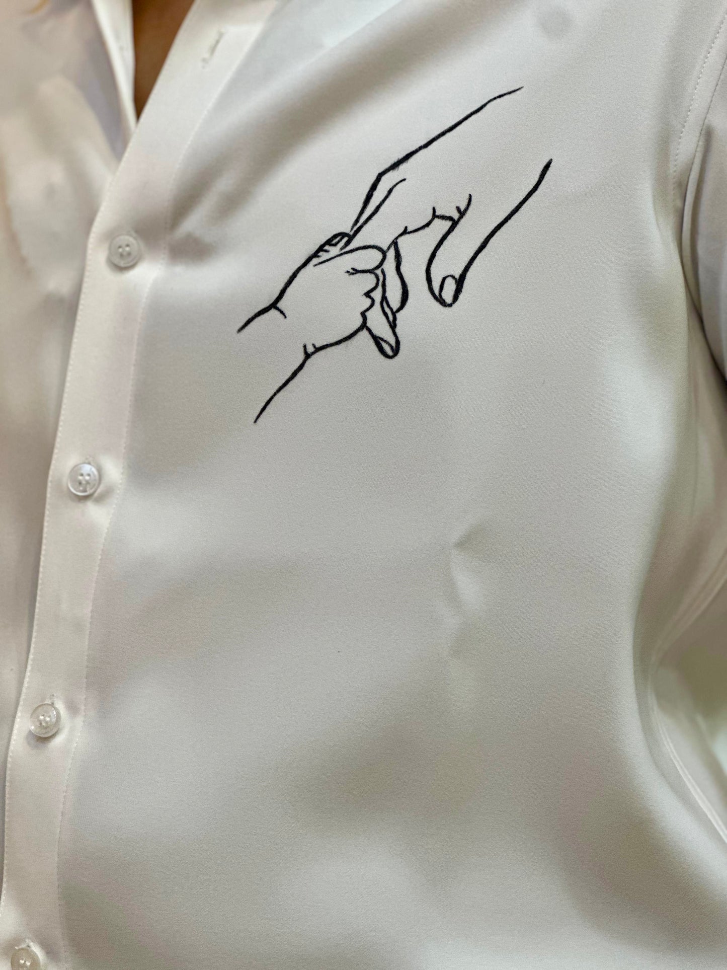 Father-Child holding hands- white shirt