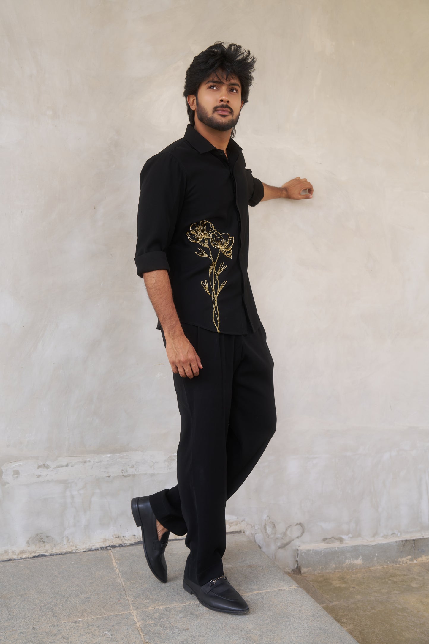 Black shirt with gold floral emrboidery design
