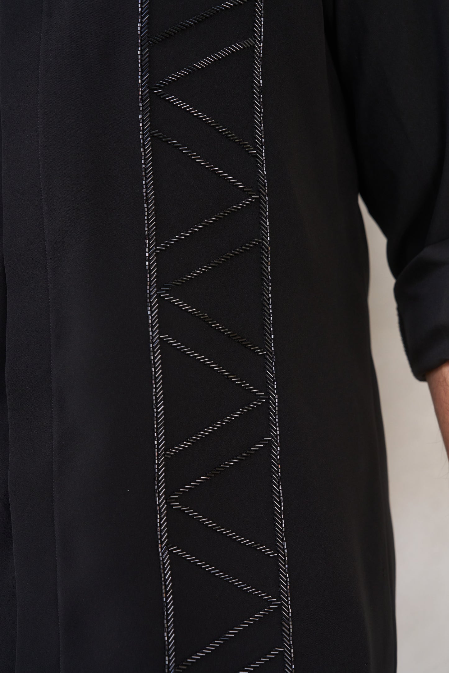 Black shirt with geometric lines embroidery design
