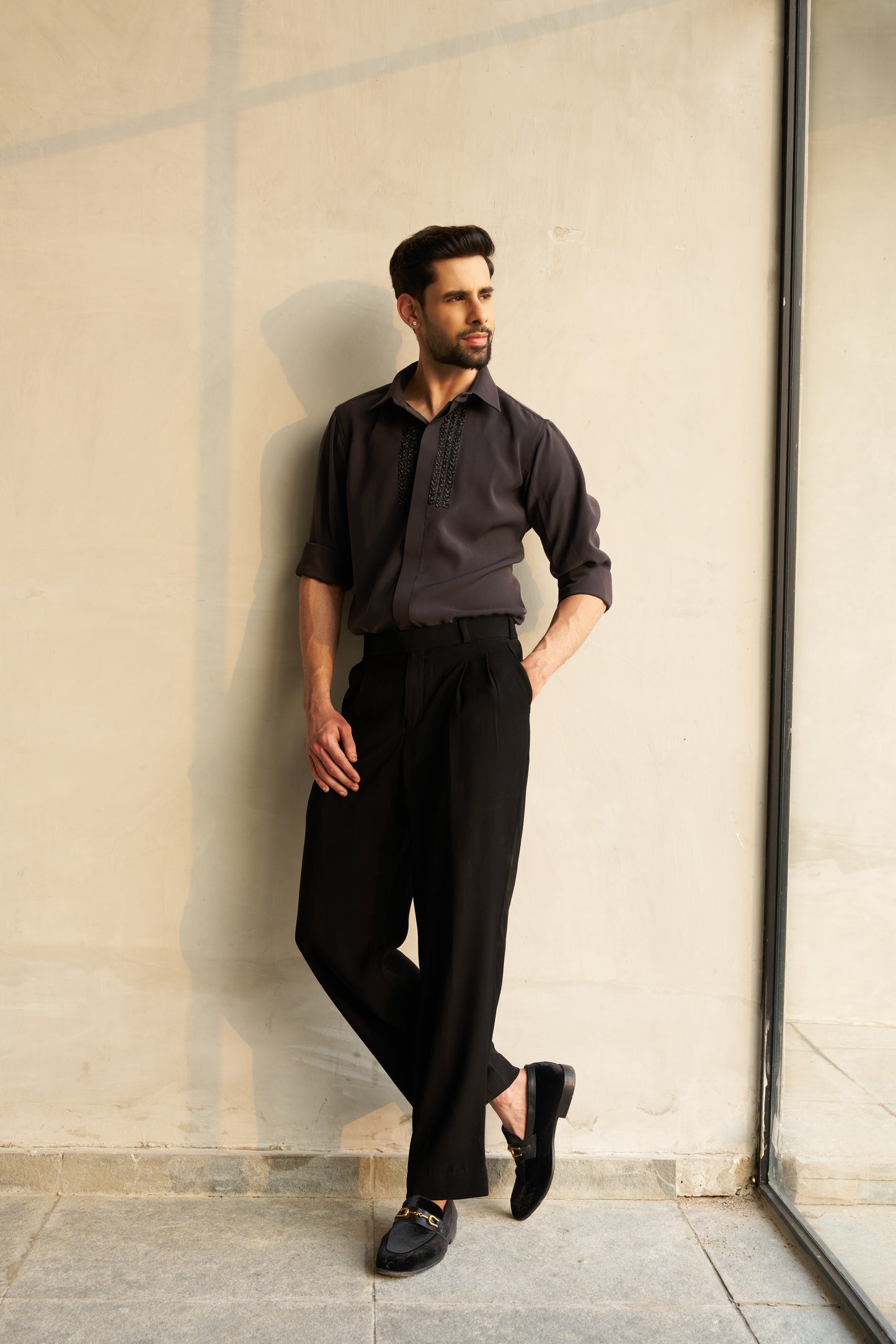 Dark grey shirt with black embellishment design