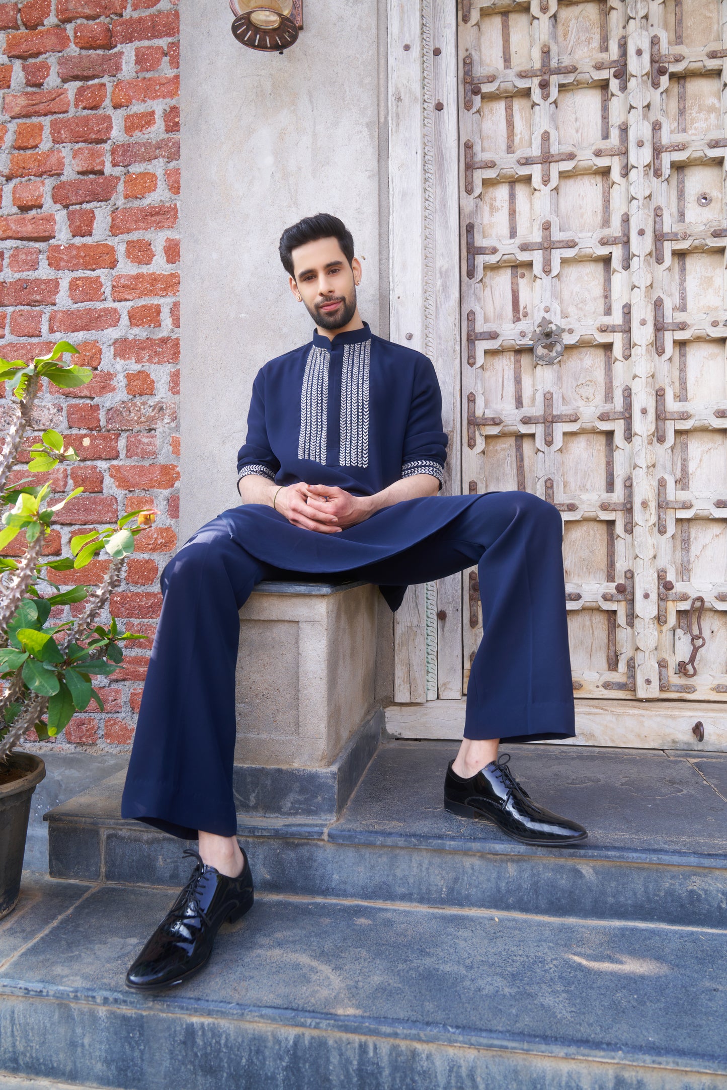Blue kurta with white intricate hand embroidery design
