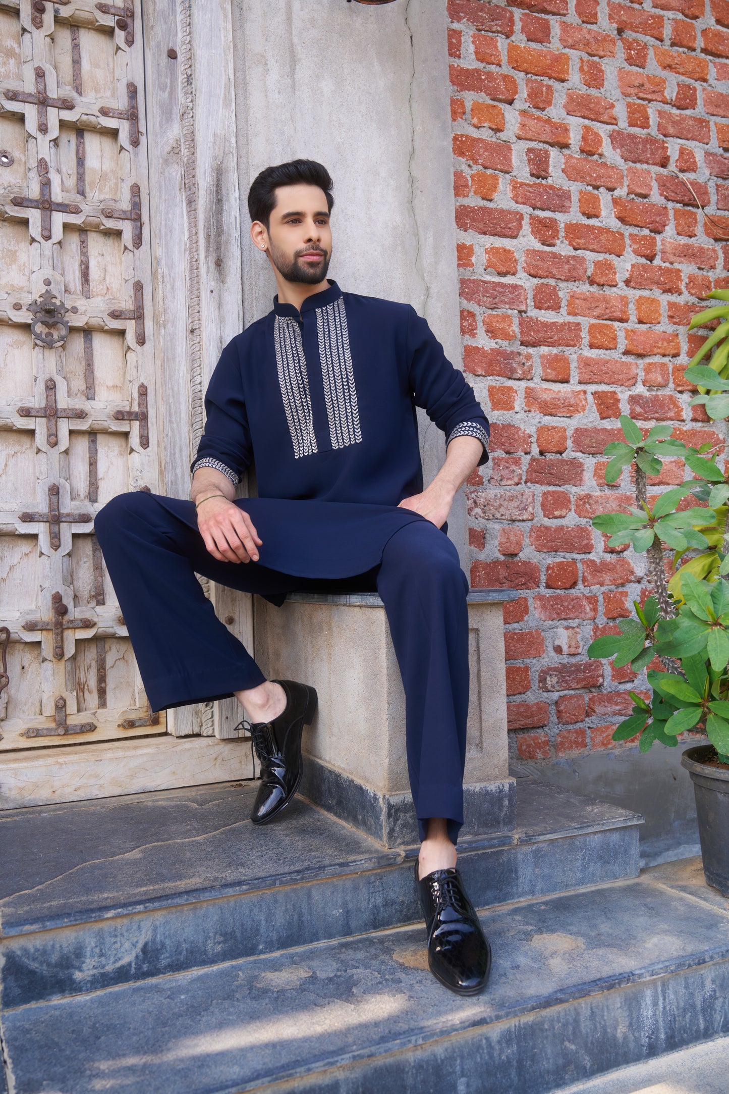 Blue kurta with white intricate hand embroidery design