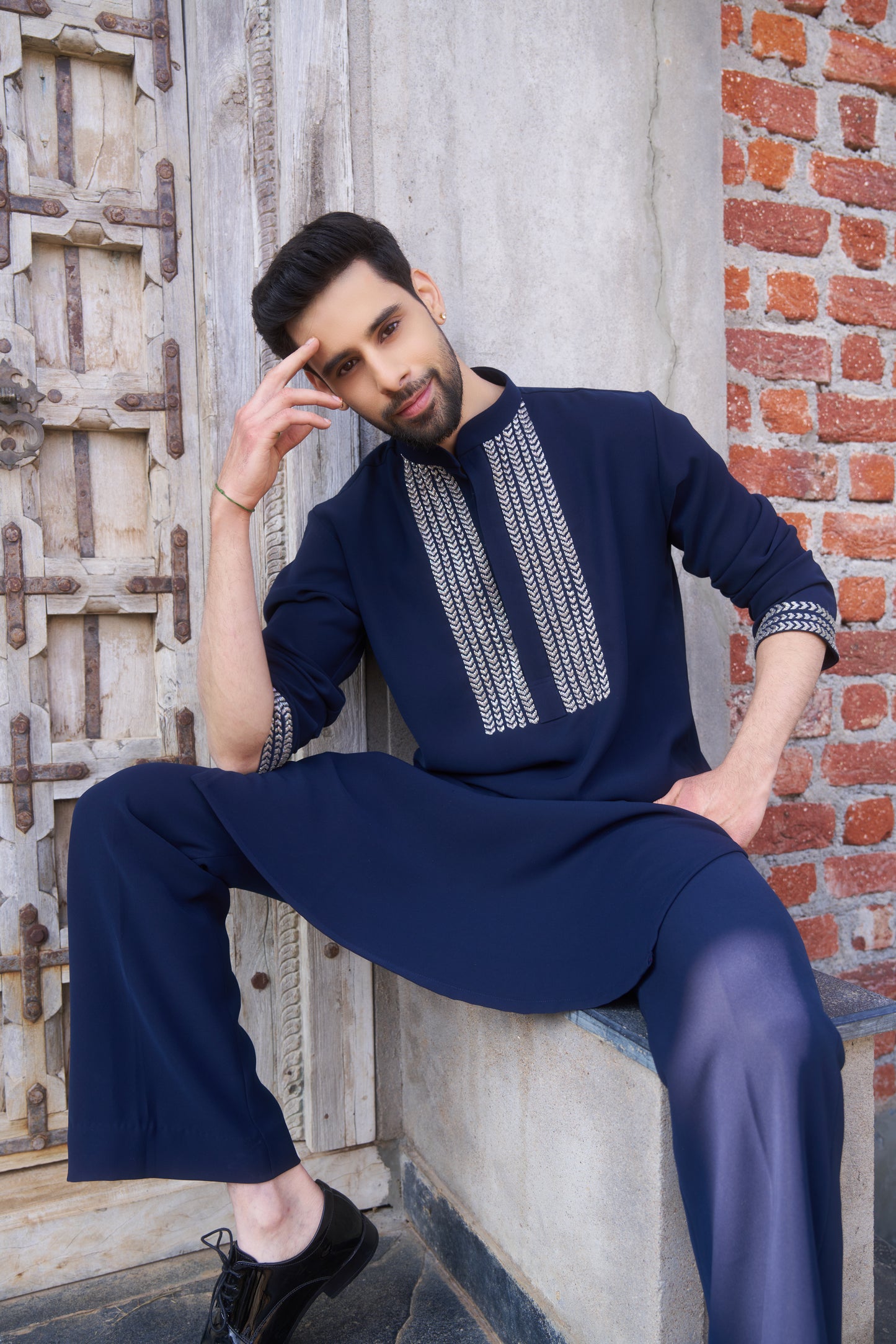 Blue kurta with white intricate hand embroidery design