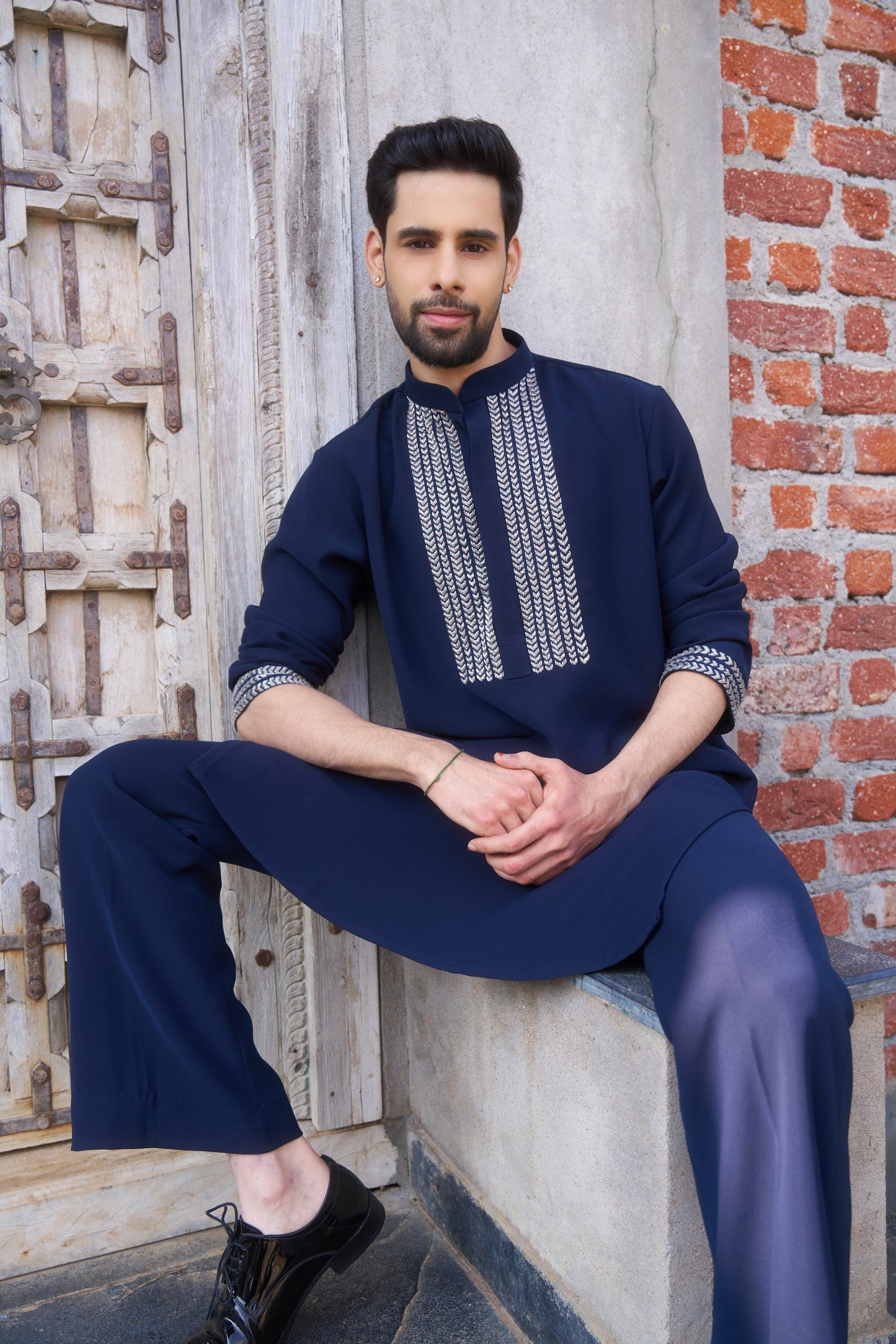 Blue kurta with white intricate hand embroidery design