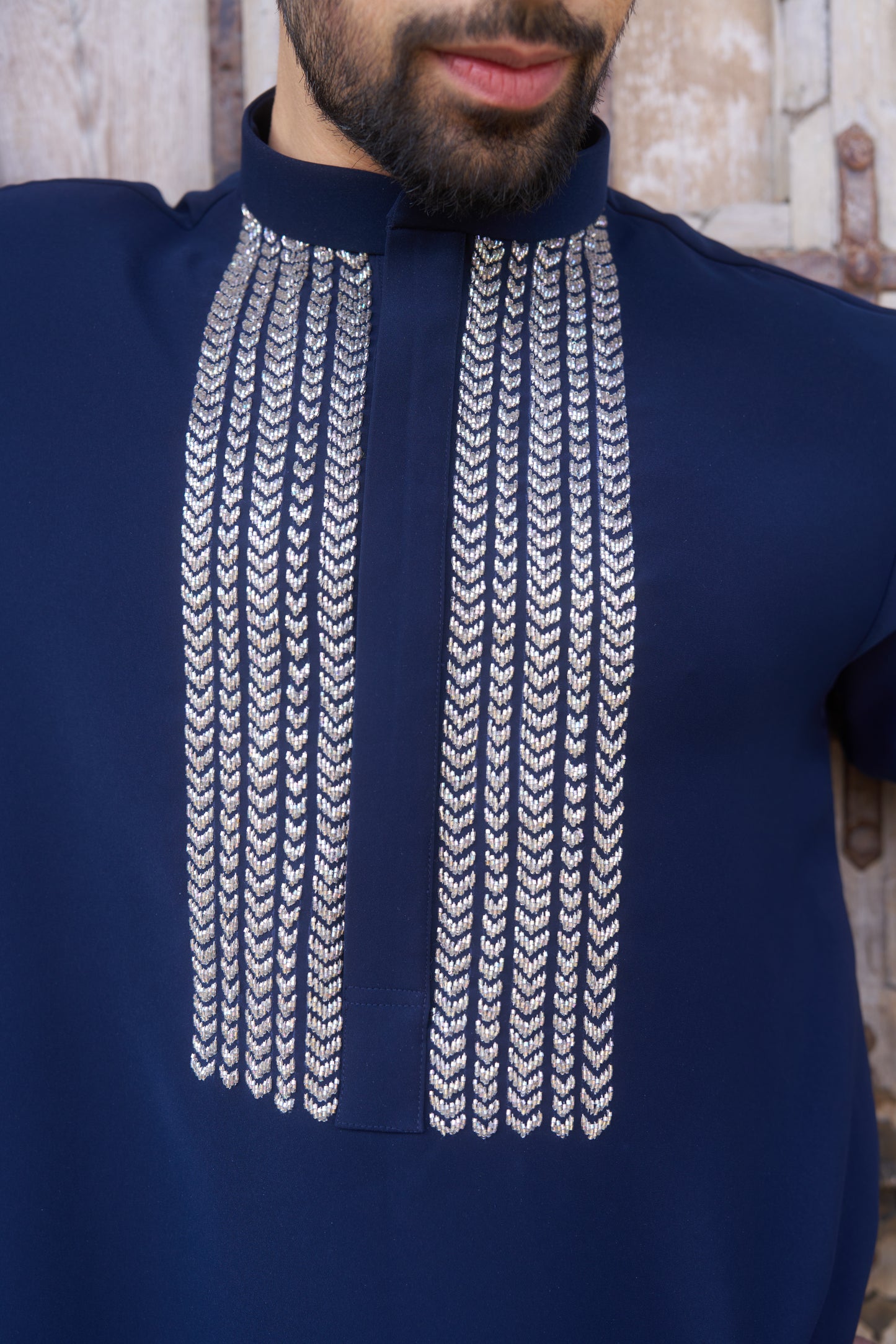 Blue kurta with white intricate hand embroidery design