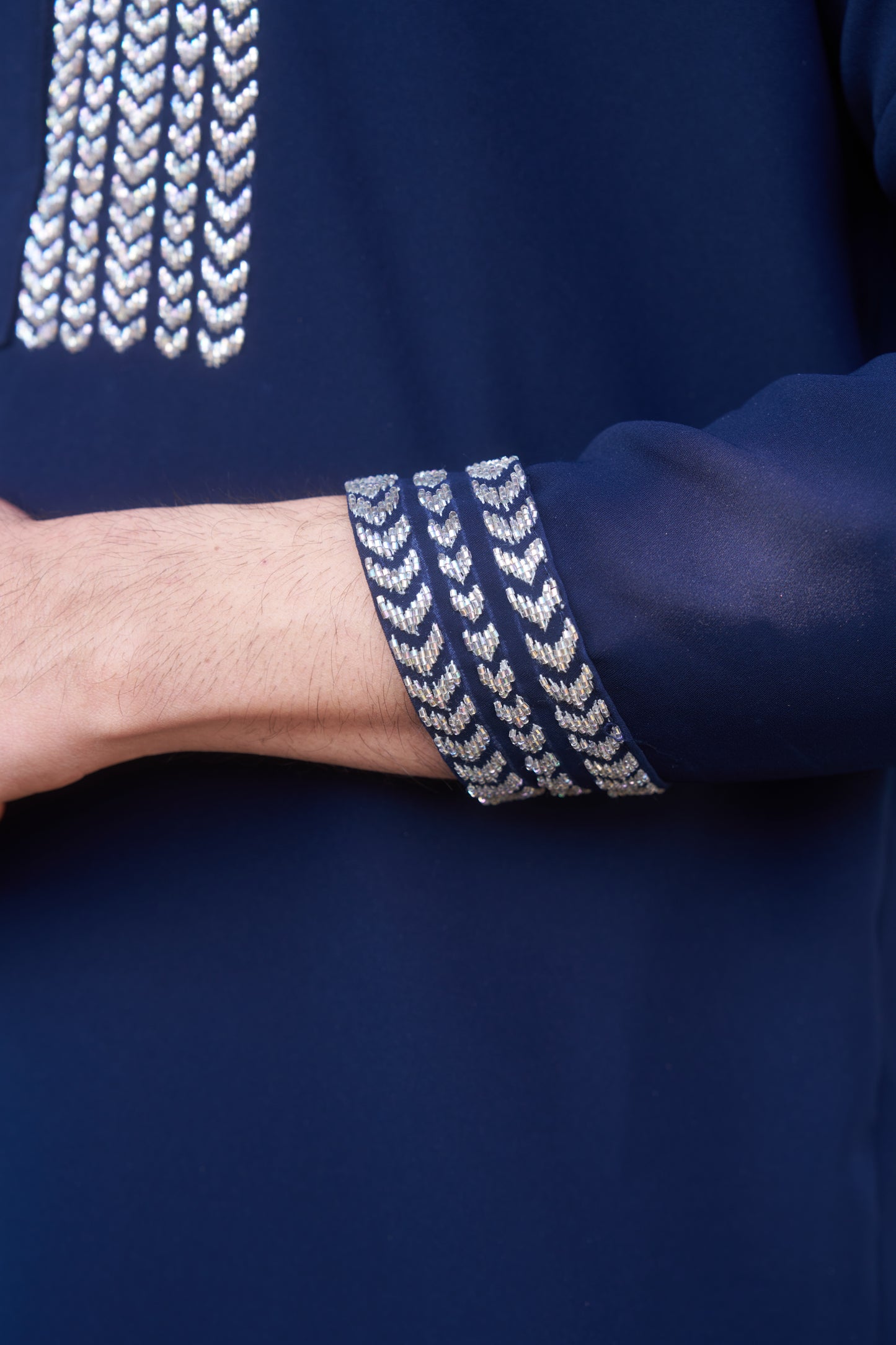 Blue kurta with white intricate hand embroidery design