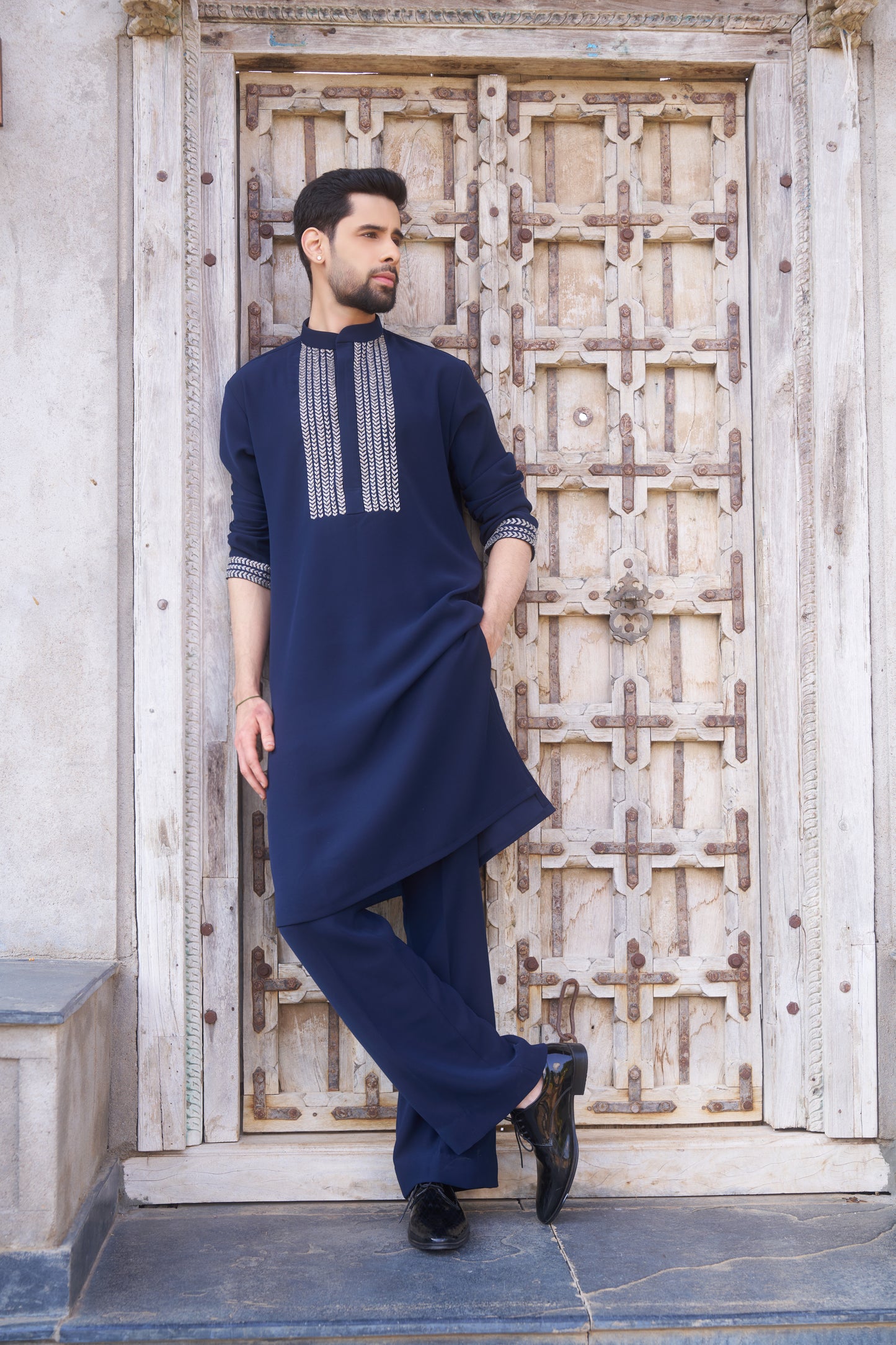 Blue kurta with white intricate hand embroidery design