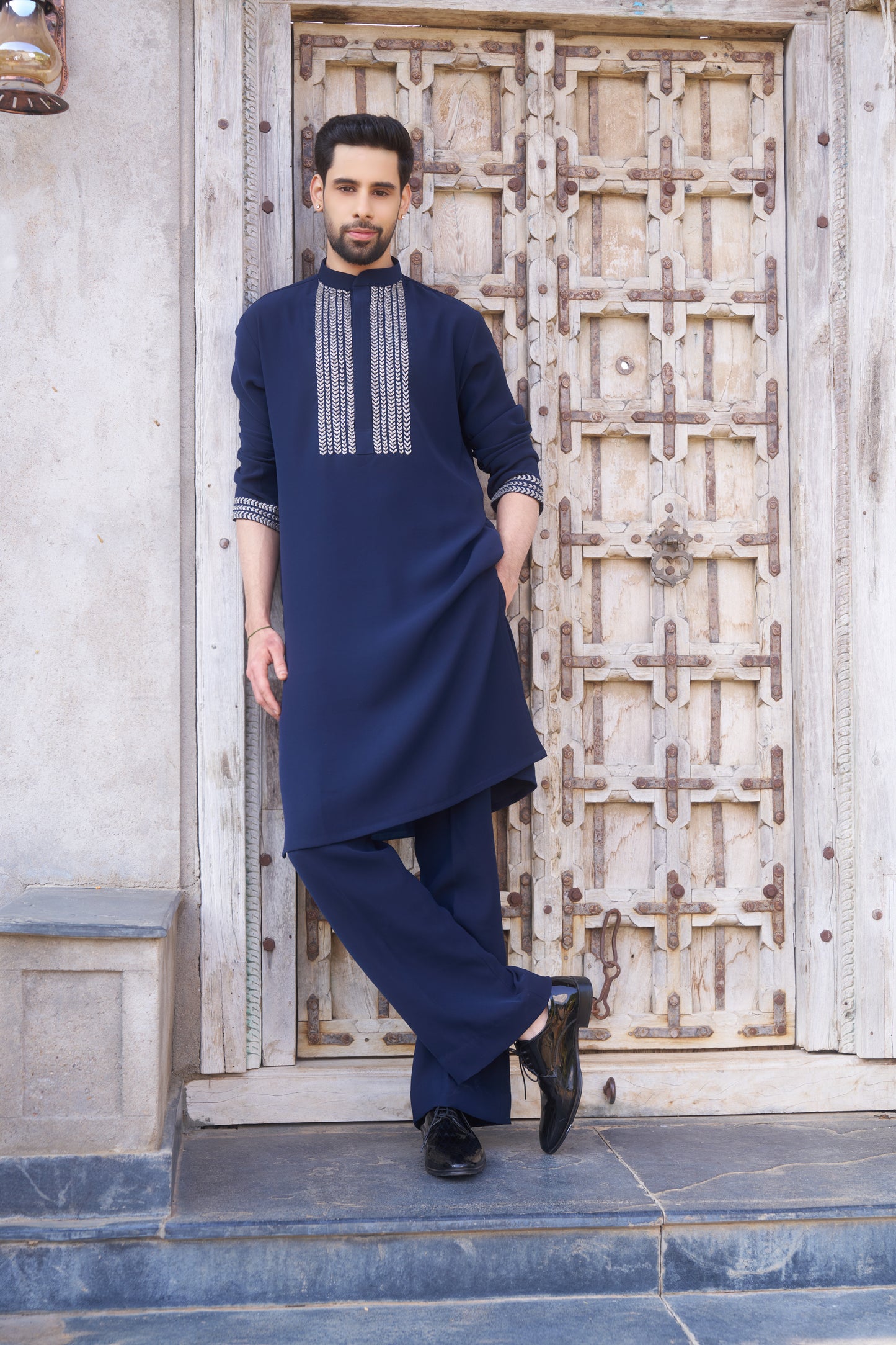 Blue kurta with white intricate hand embroidery design