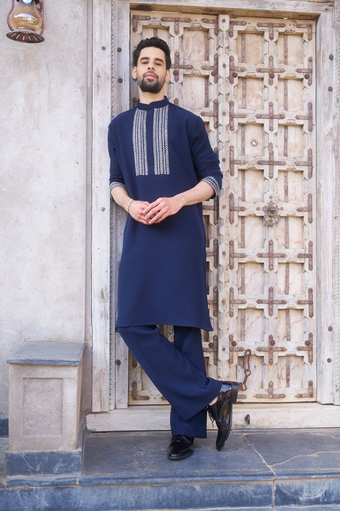 Blue kurta with white intricate hand embroidery design