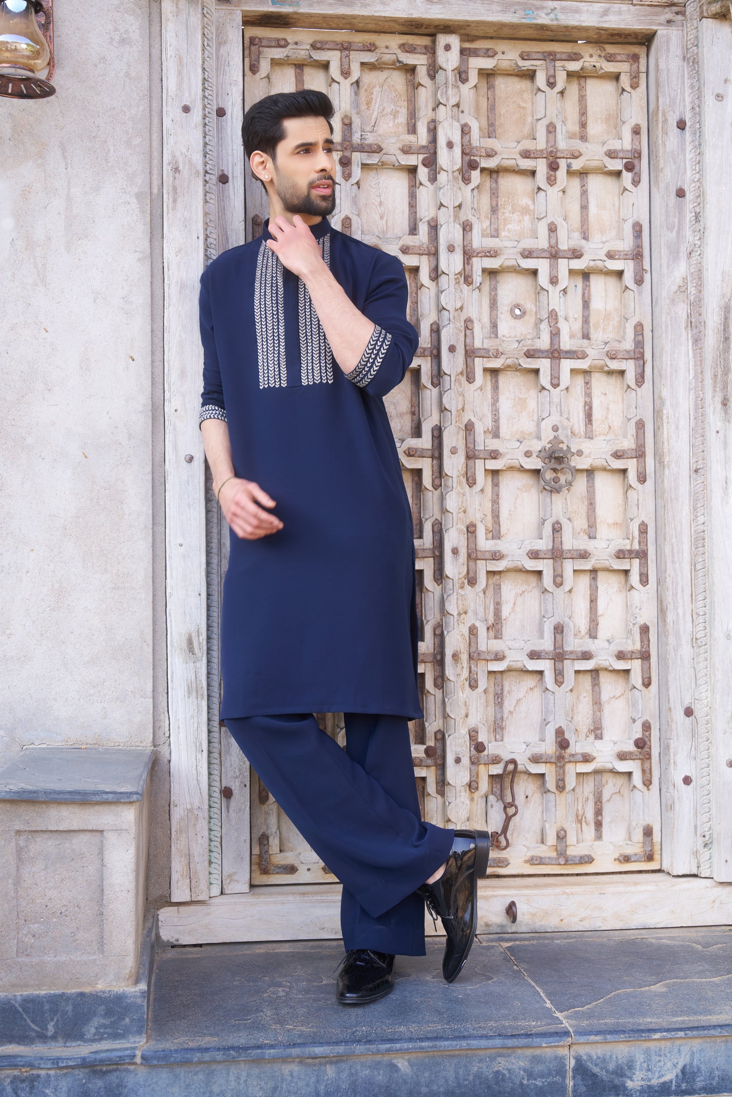 Blue kurta with white intricate hand embroidery design