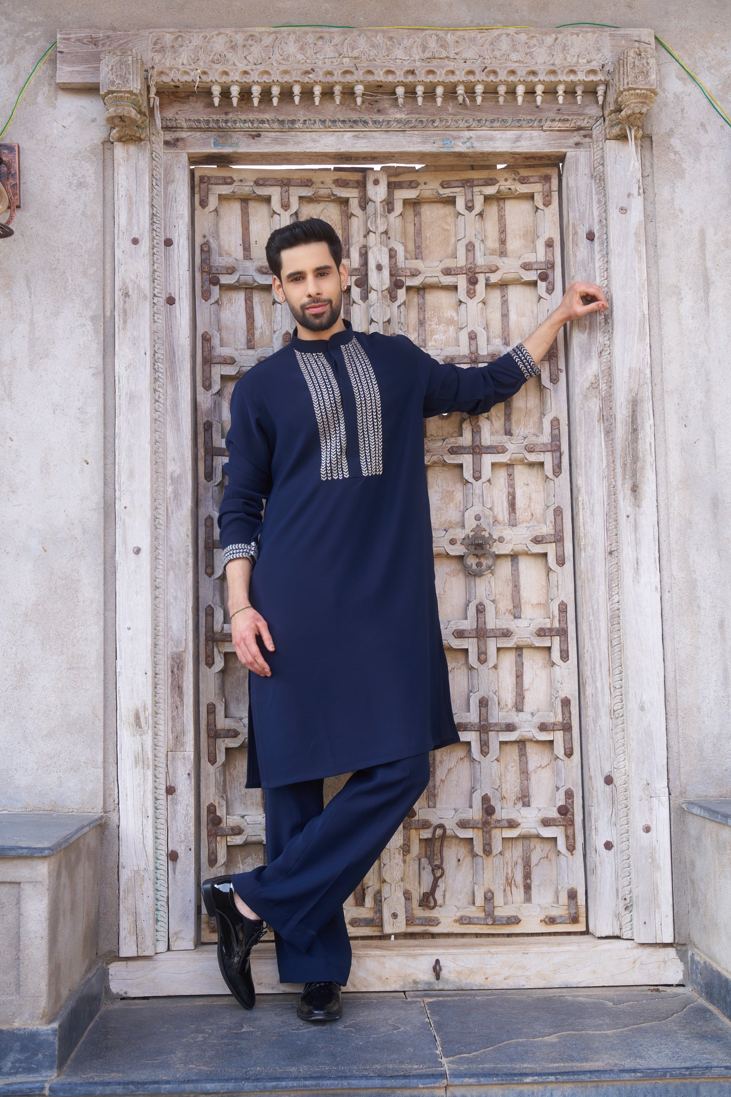 Blue kurta with white intricate hand embroidery design