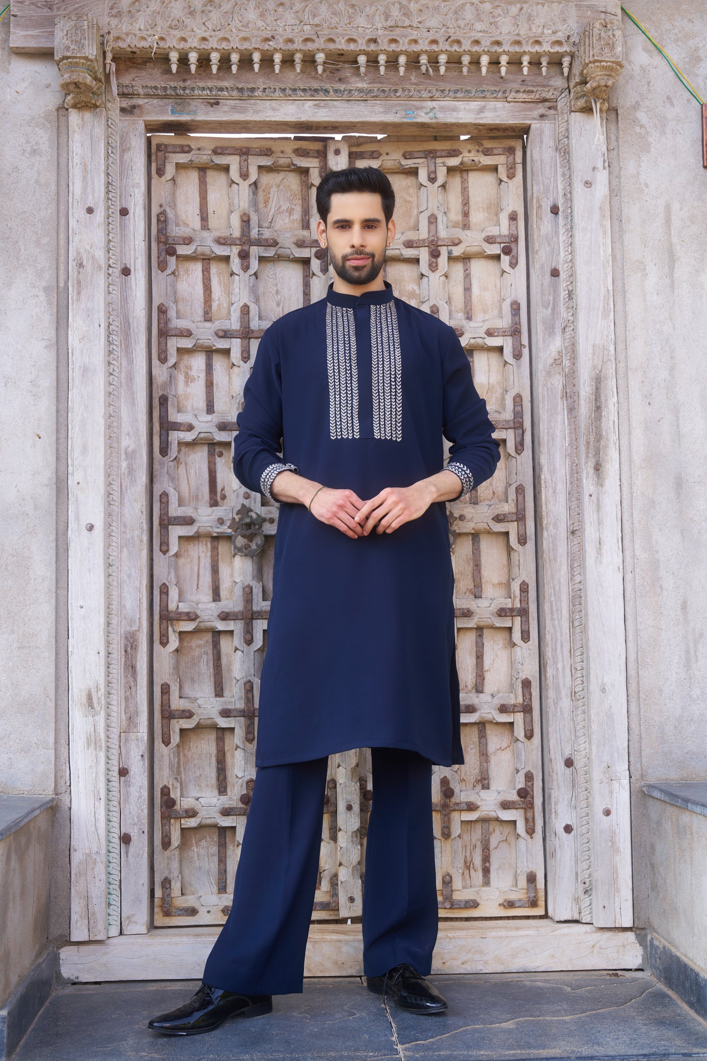 Blue kurta with white intricate hand embroidery design