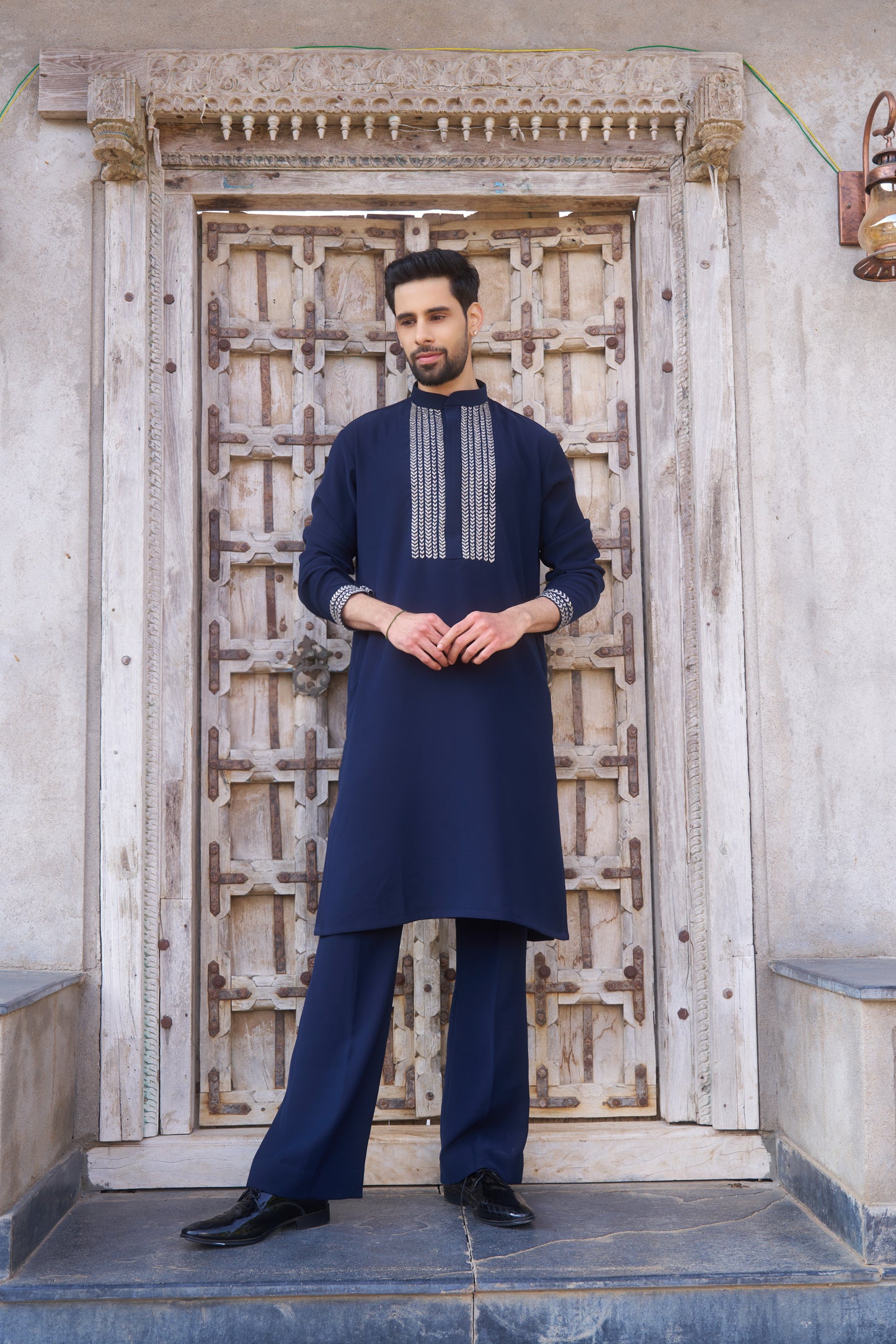 Blue kurta with white intricate hand embroidery design