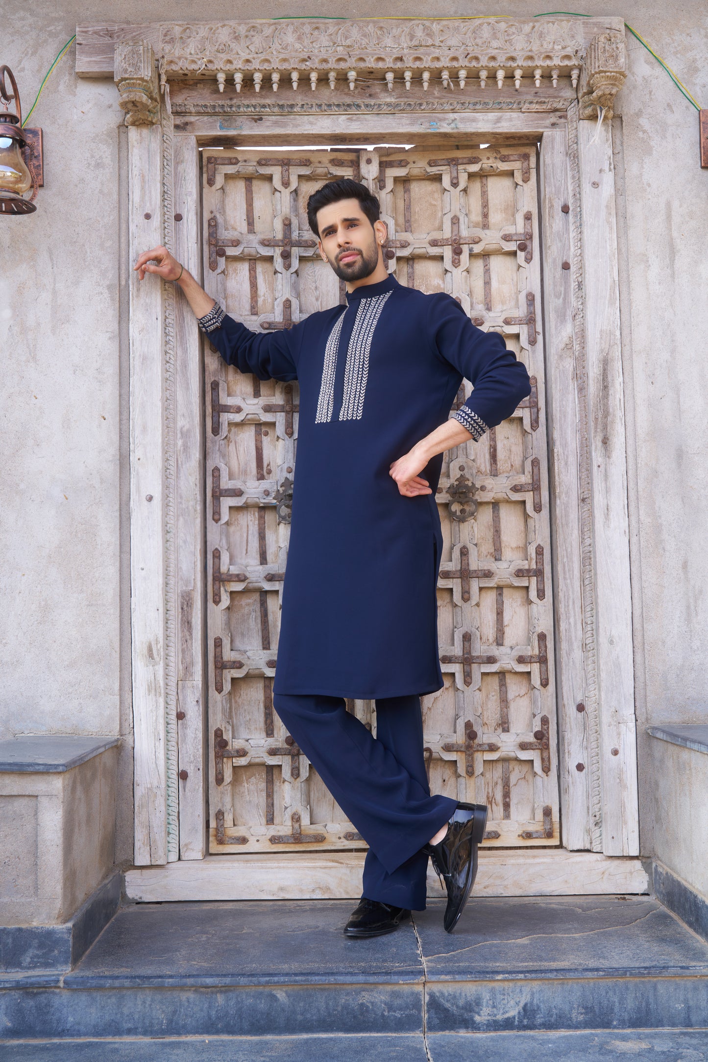 Blue kurta with white intricate hand embroidery design