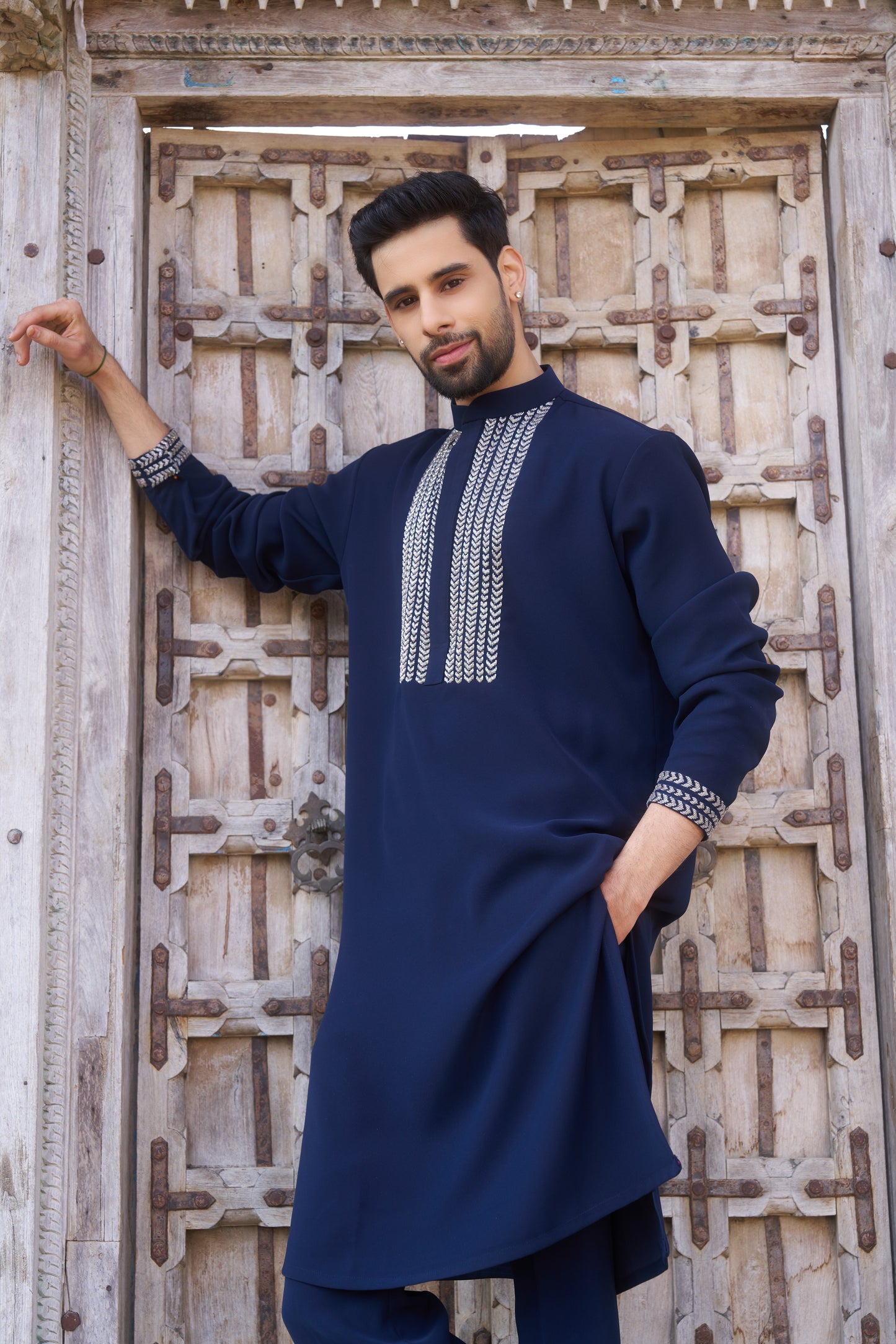 Blue kurta with white intricate hand embroidery design