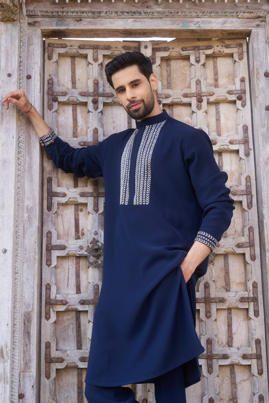 Blue kurta with white intricate hand embroidery design