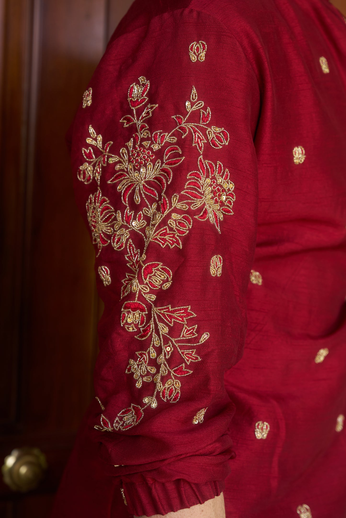 Red traditional zipper kurta with gold floral embroidery design