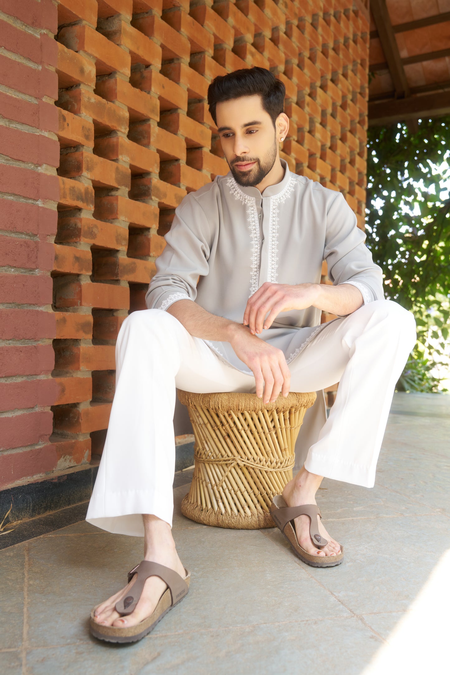 Light green kurtha with white hand embroidery design