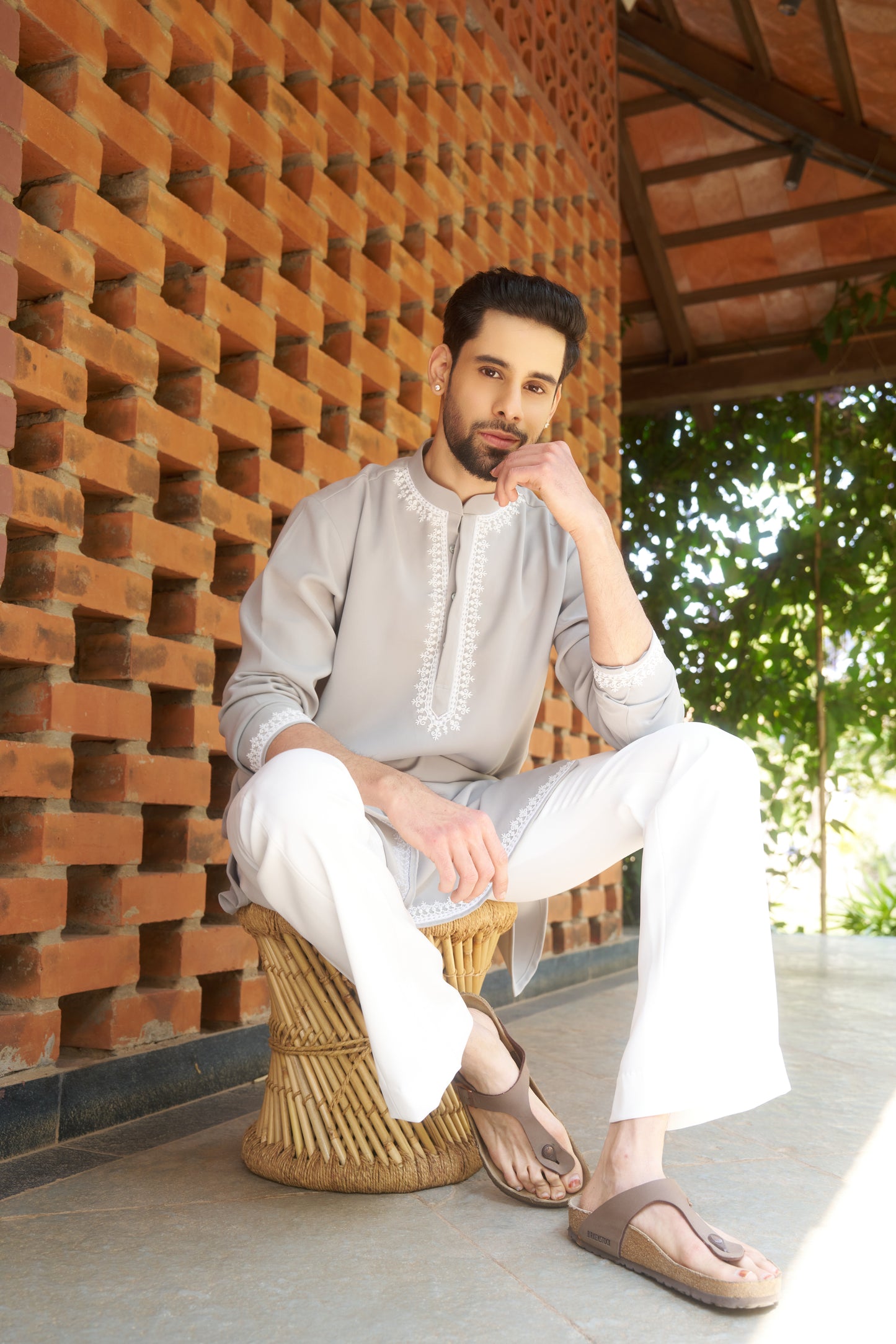 Light green kurtha with white hand embroidery design