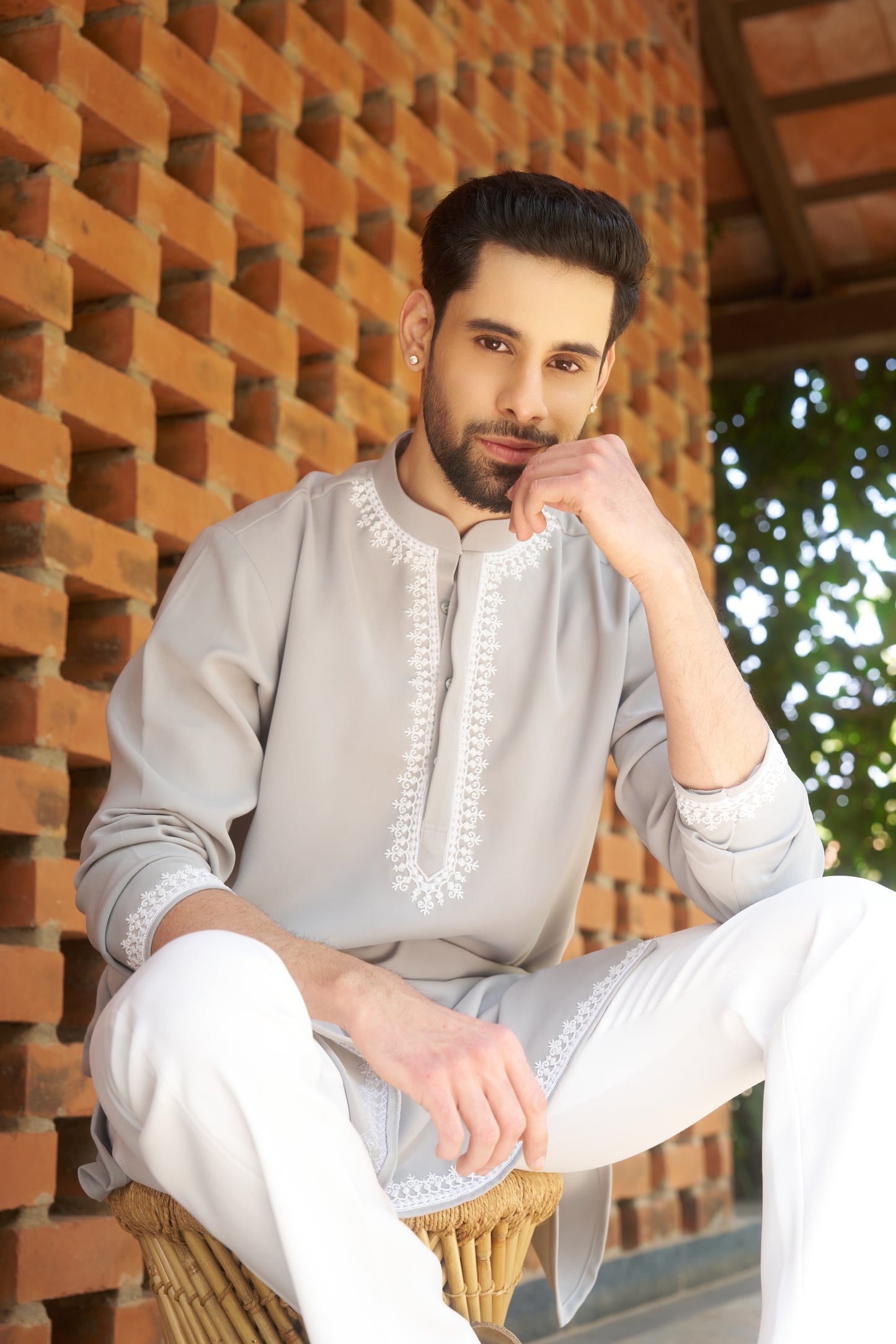 Light green kurtha with white hand embroidery design