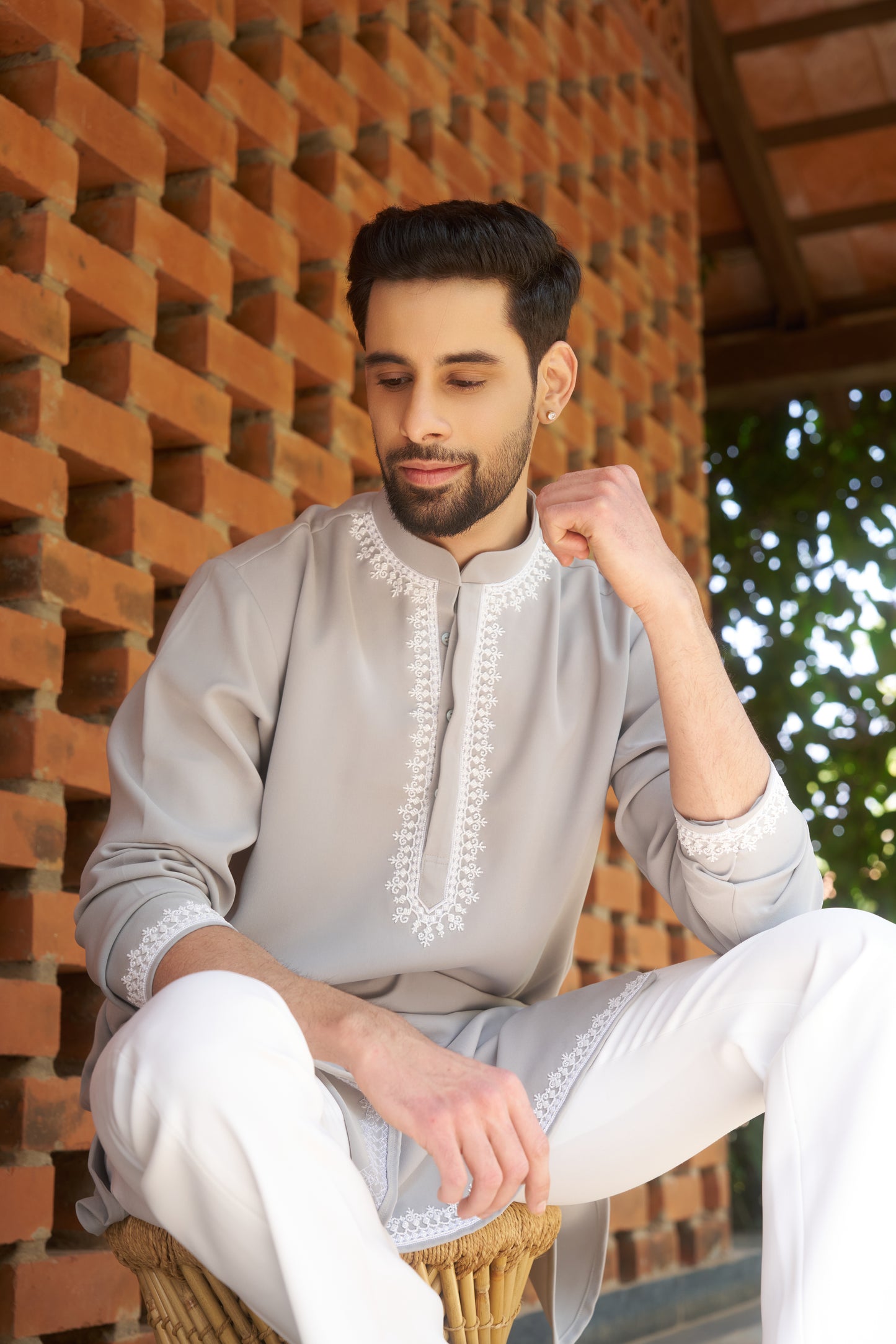 Light green kurtha with white hand embroidery design