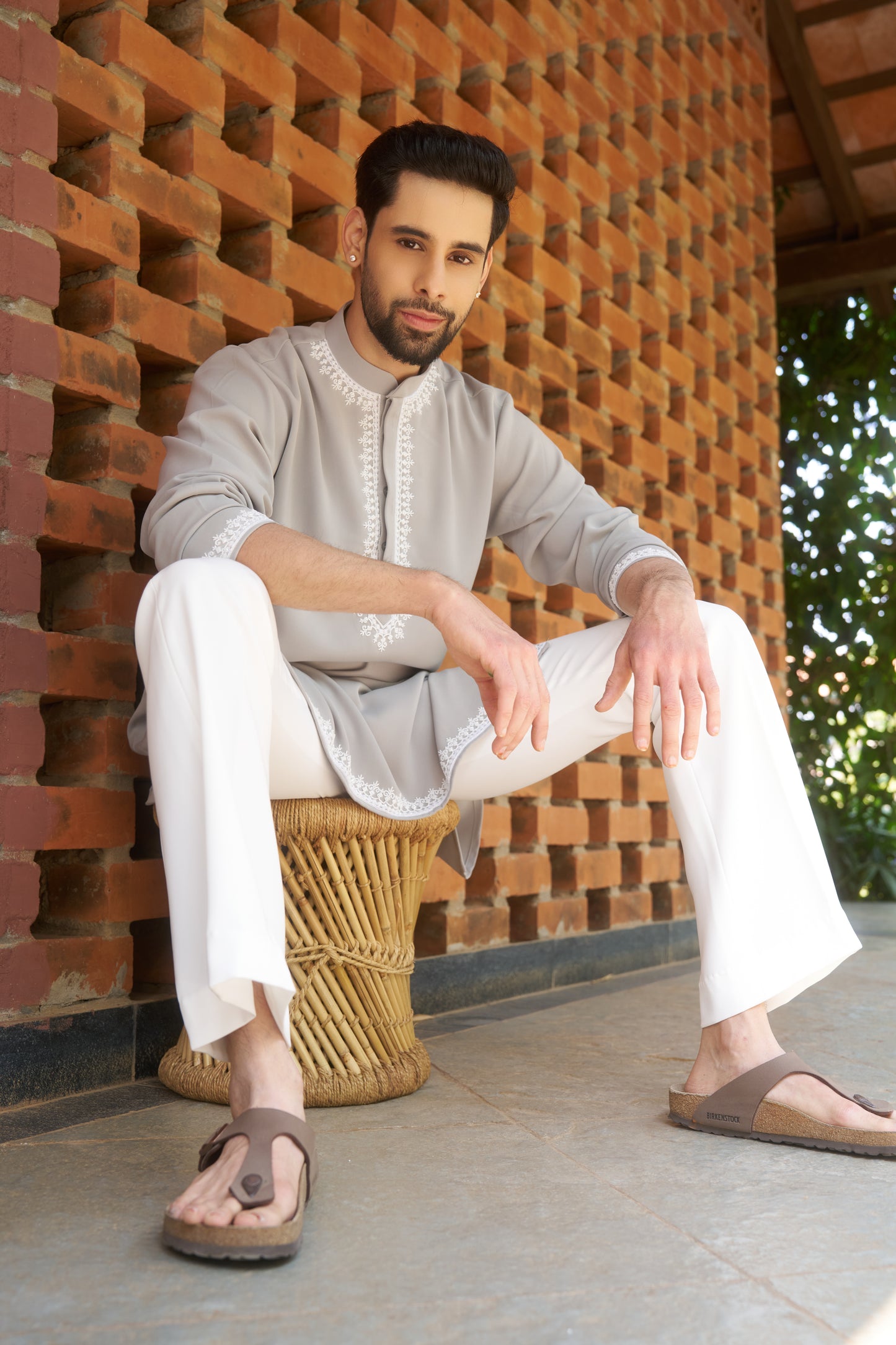 Light green kurtha with white hand embroidery design