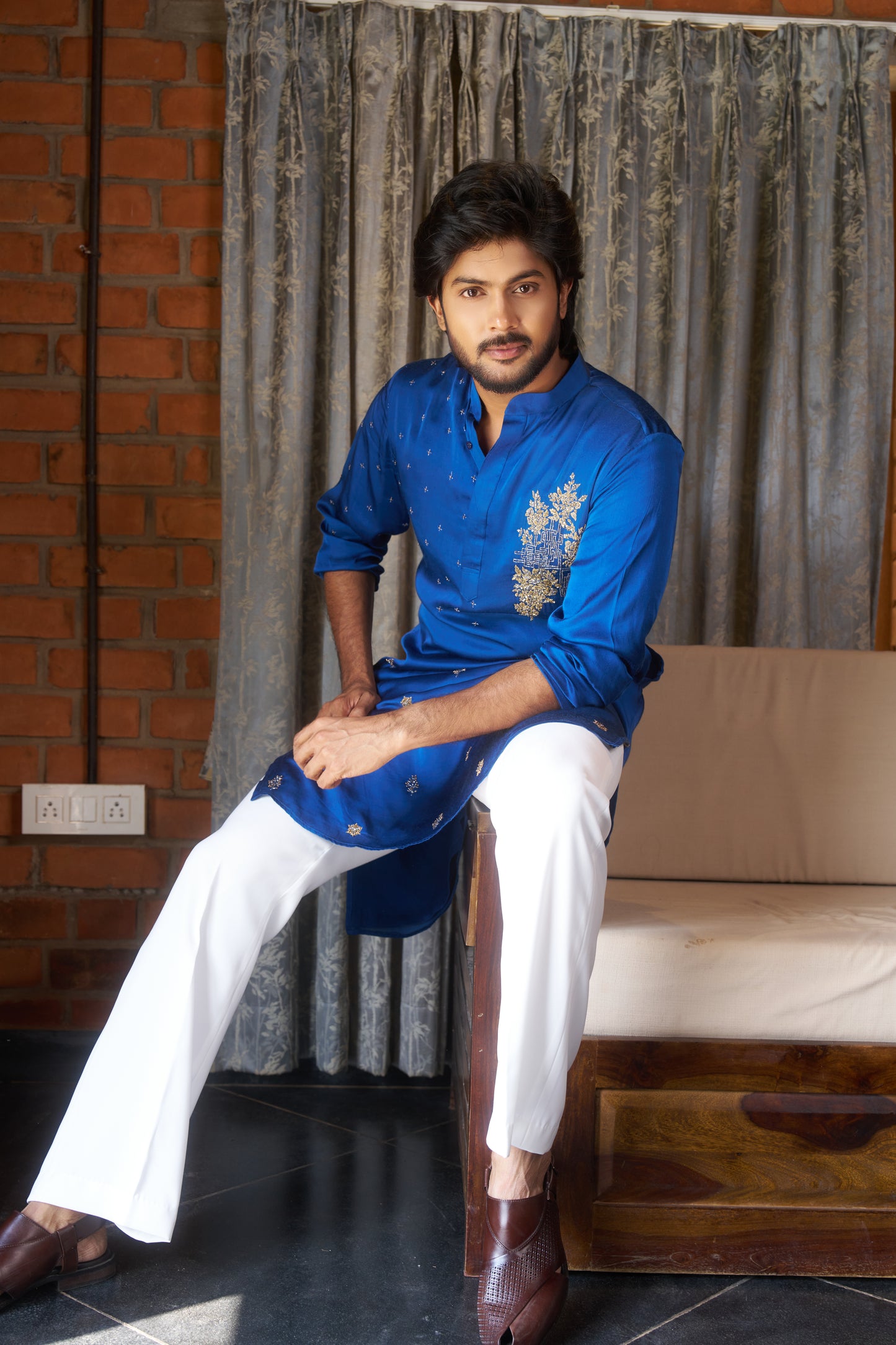 Blue traditional kurta with intricate gold embroidery design