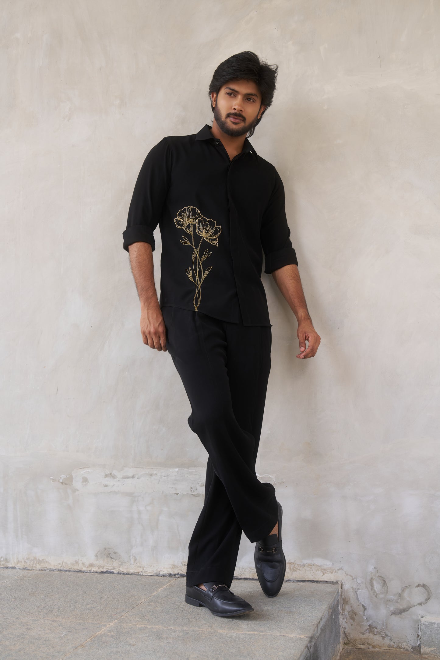 Black shirt with gold floral emrboidery design