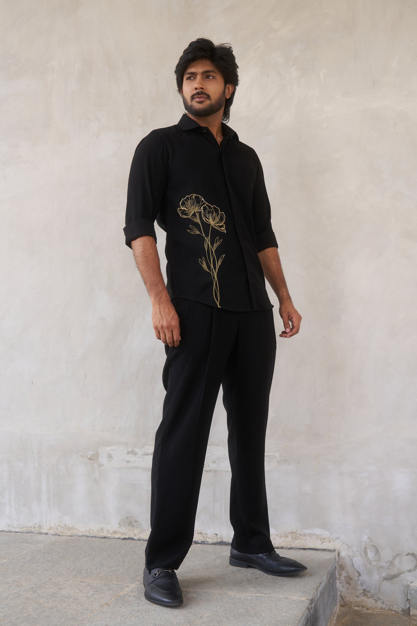 Black shirt with gold floral emrboidery design