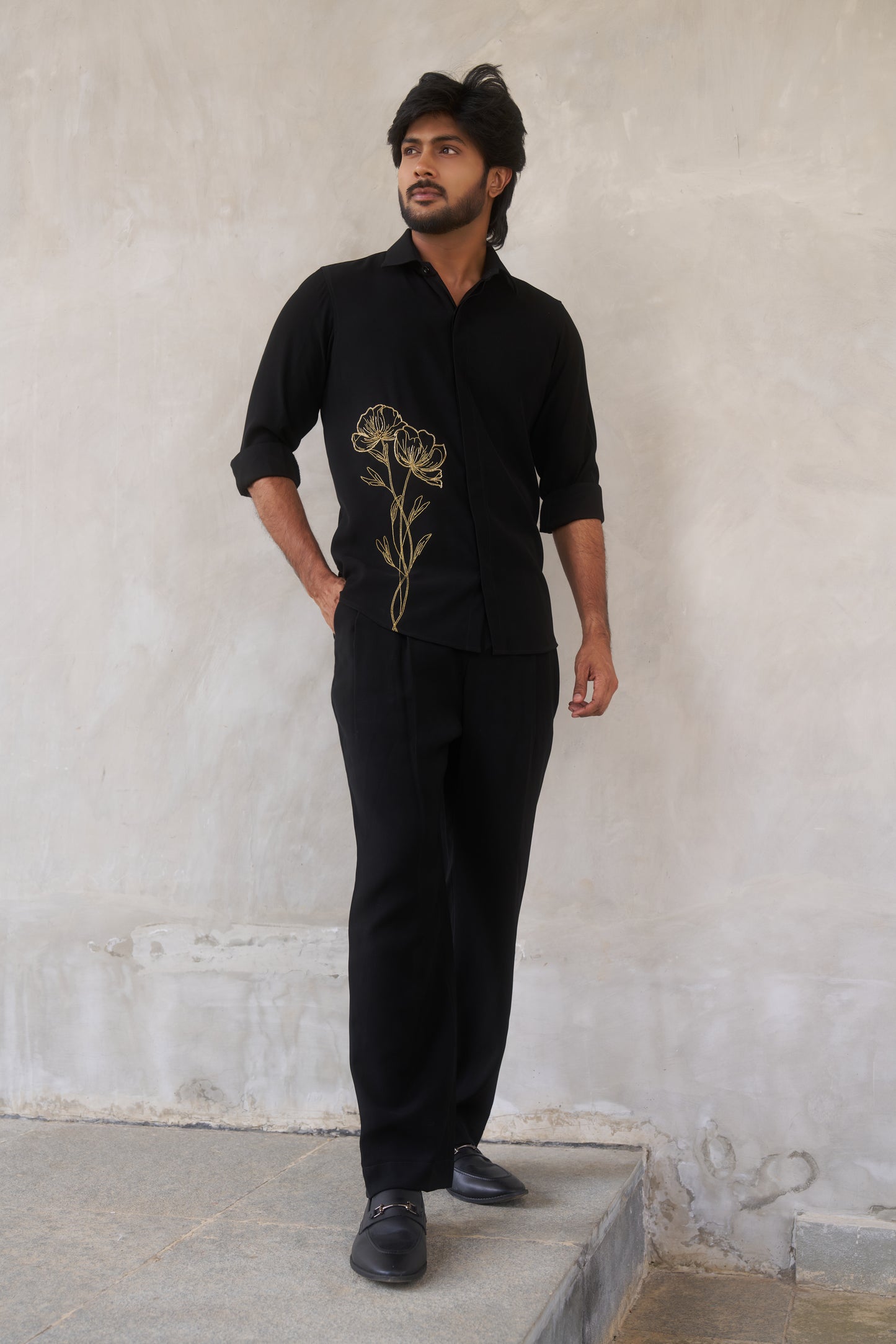 Black shirt with gold floral emrboidery design