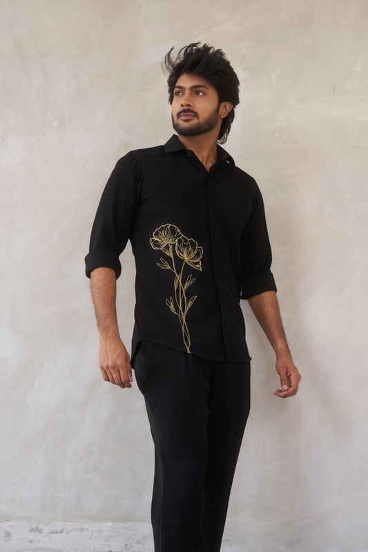Black shirt with gold floral emrboidery design