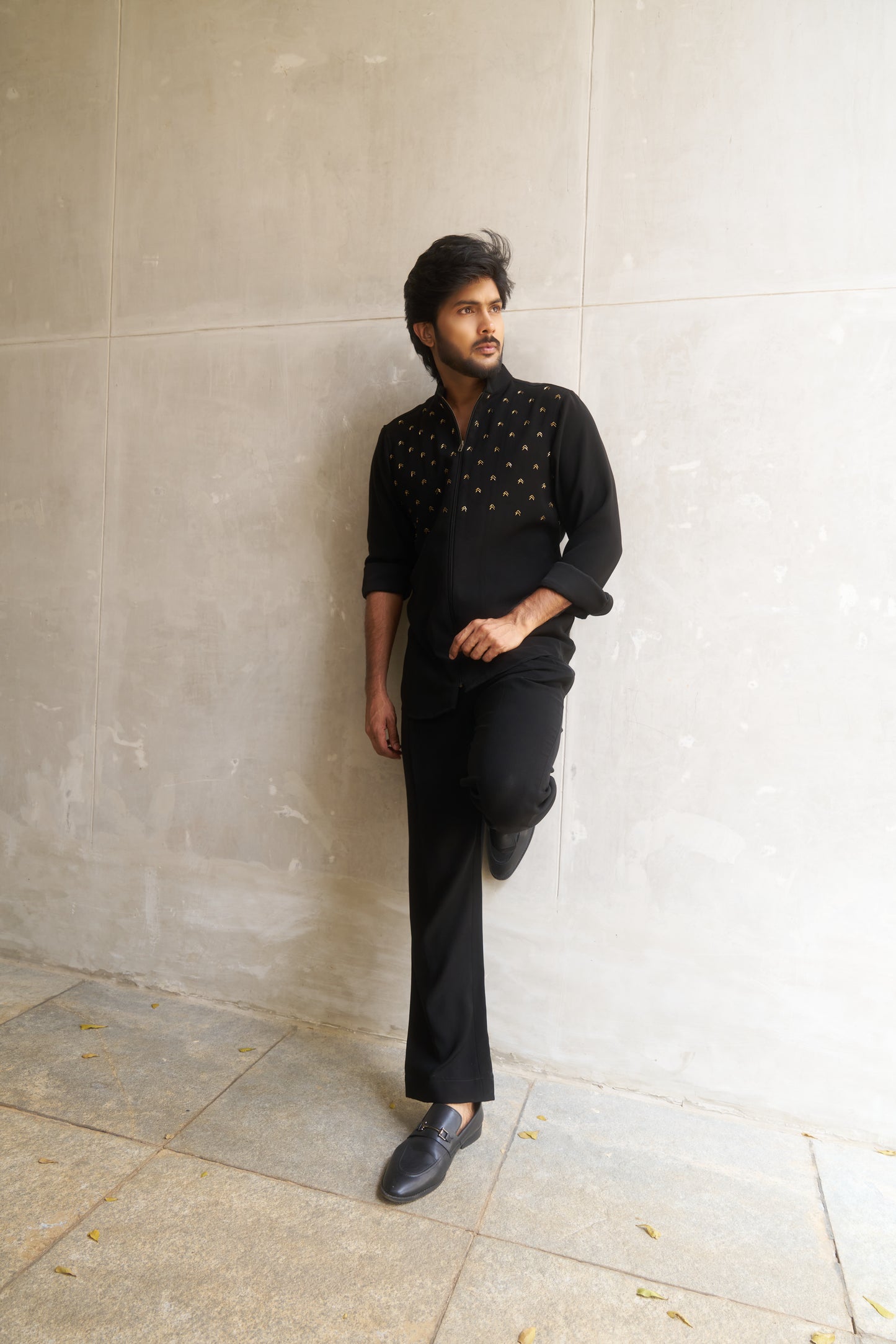 Black zipper shirt with gold arrow design
