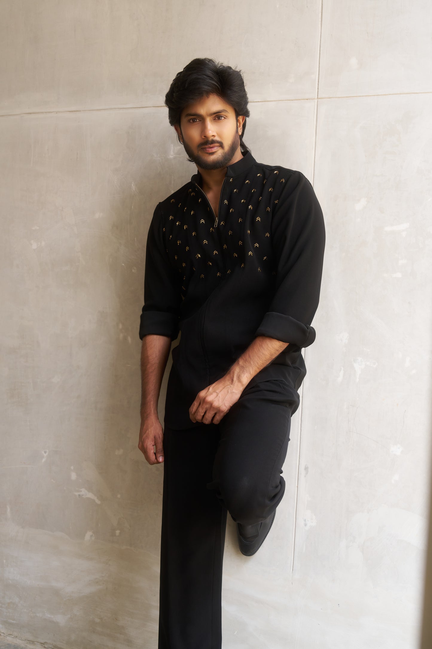 Black zipper shirt with gold arrow design