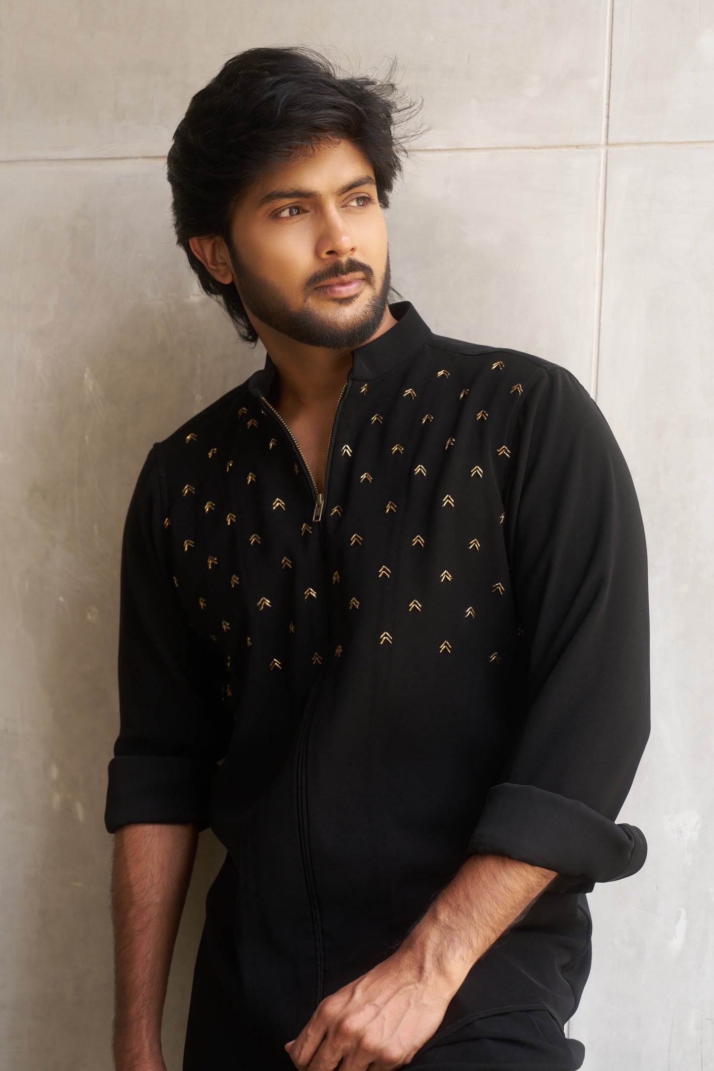 Black zipper shirt with gold arrow design