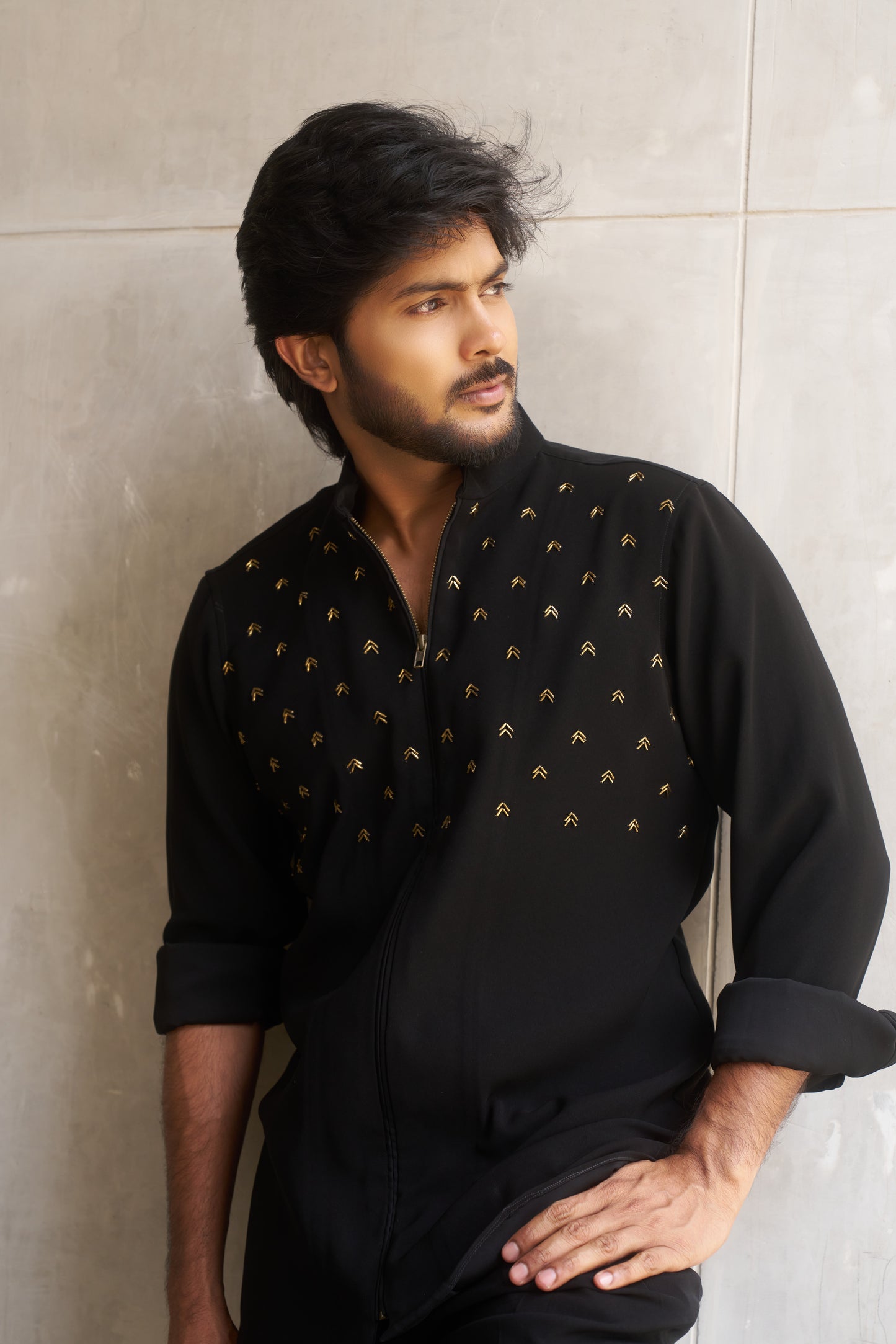 Black zipper shirt with gold arrow design