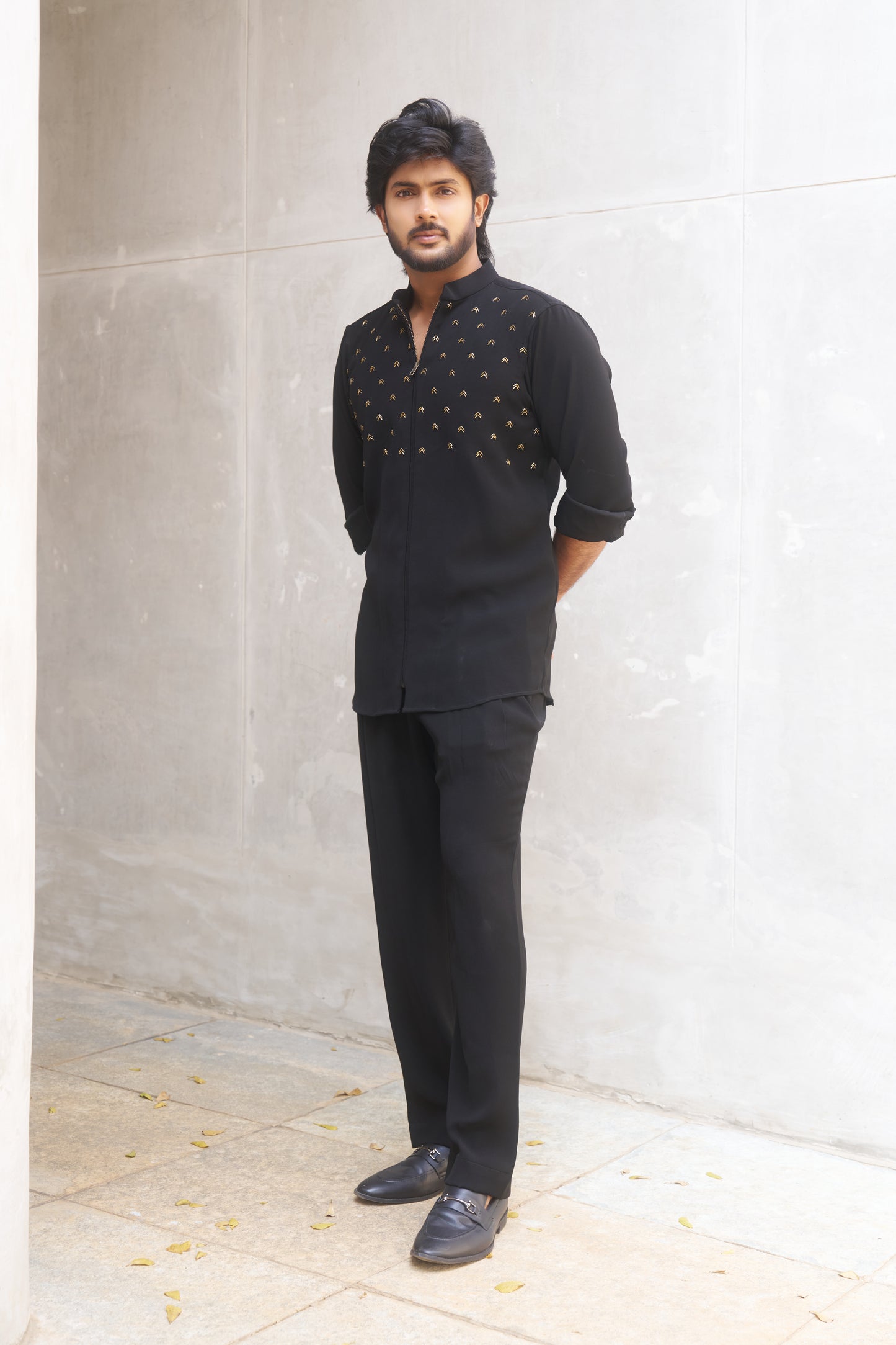 Black zipper shirt with gold arrow design