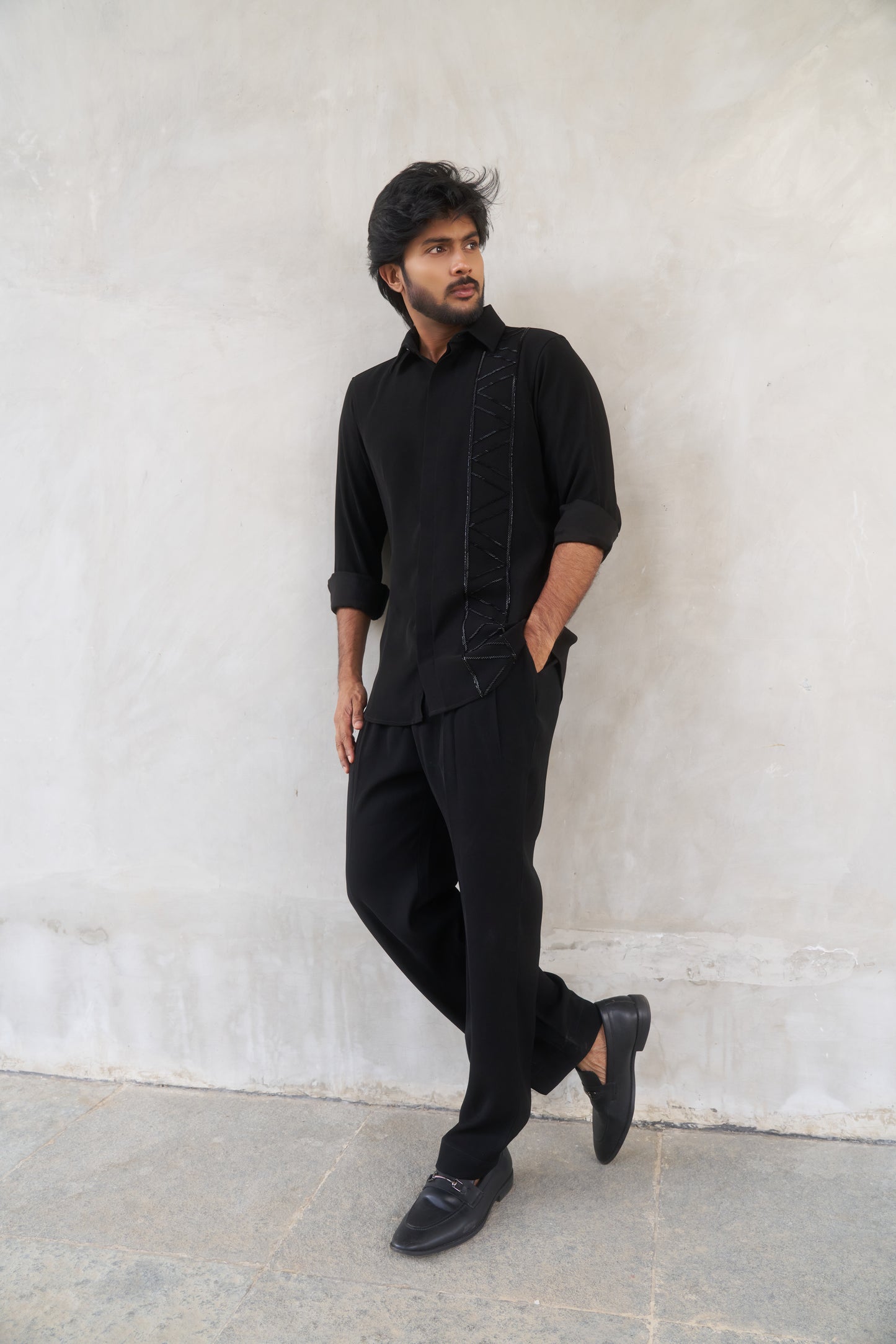 Black shirt with geometric lines embroidery design