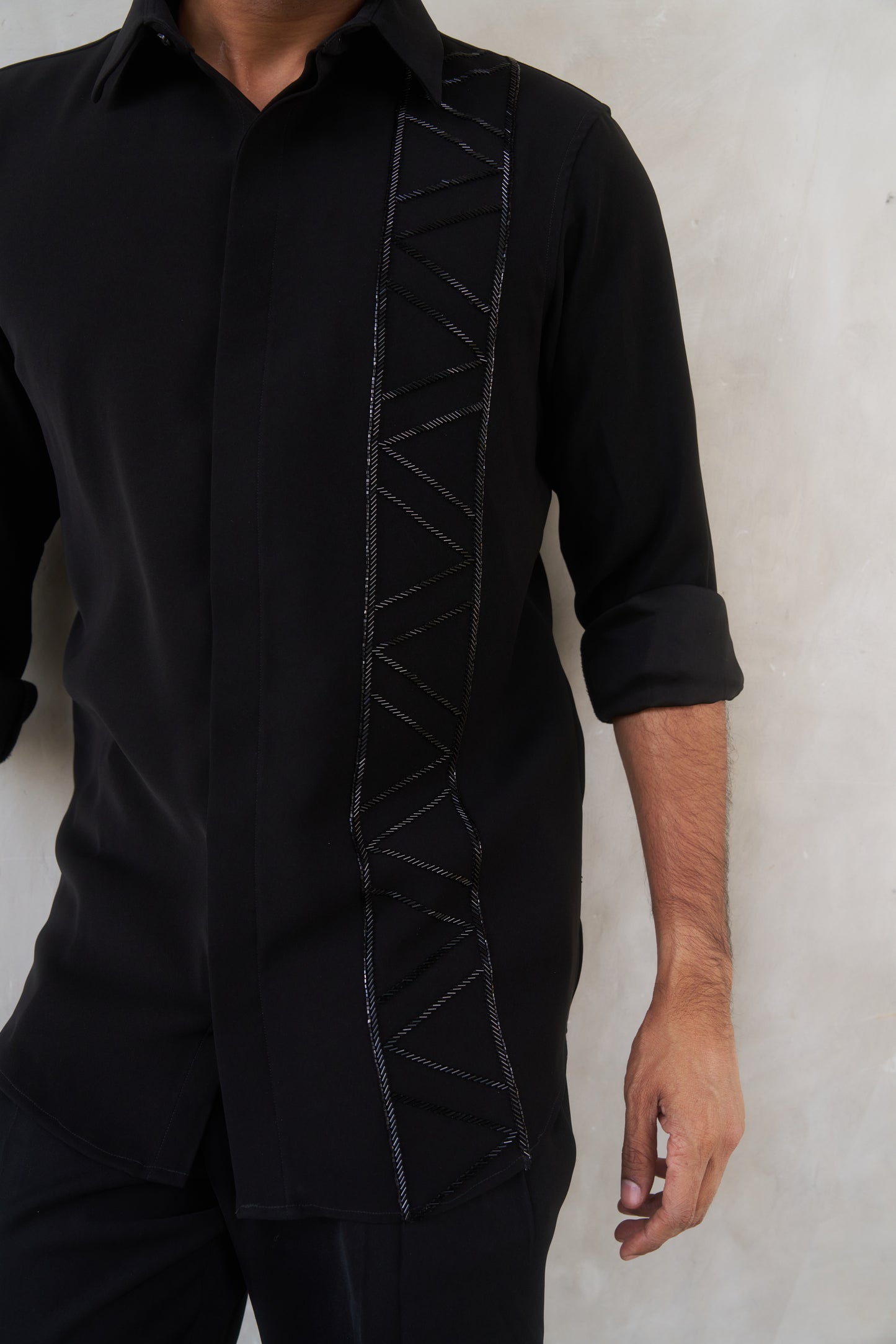 Black shirt with geometric lines embroidery design