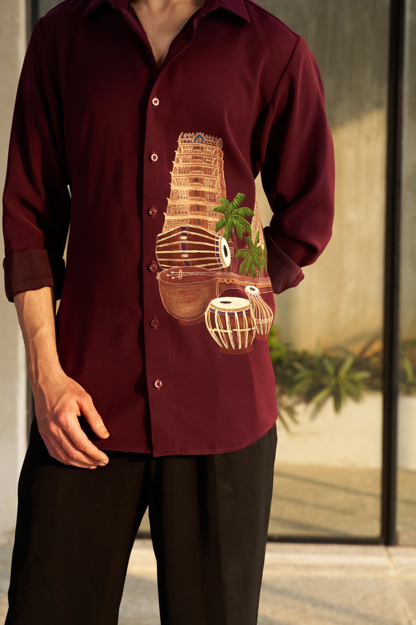 Burgundy shirt with Temple and musical instruments hand painted design