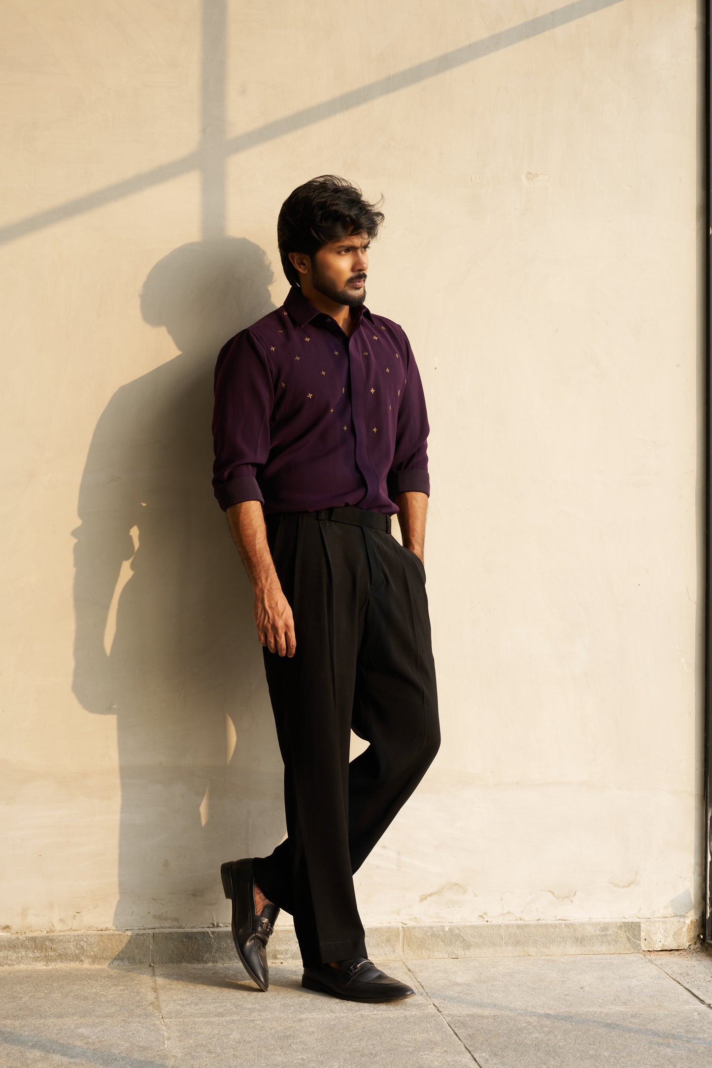 Dark Purple shirt with gold star shaped patterns design