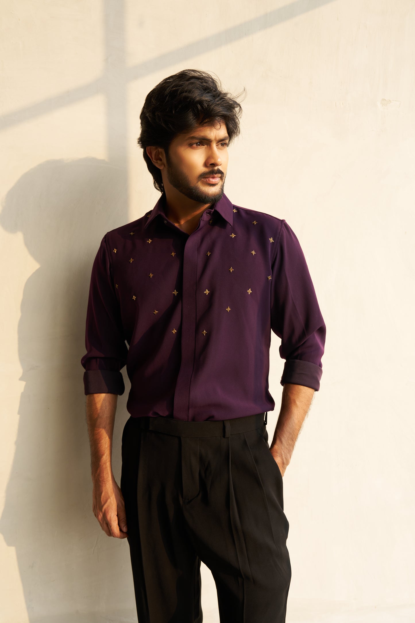 Dark Purple shirt with gold star shaped patterns design