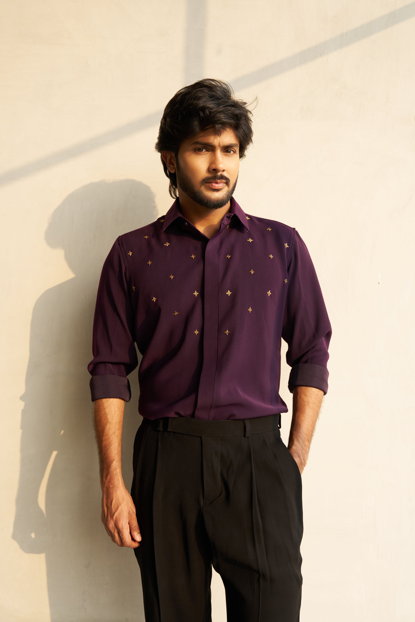 Dark Purple shirt with gold star shaped patterns design