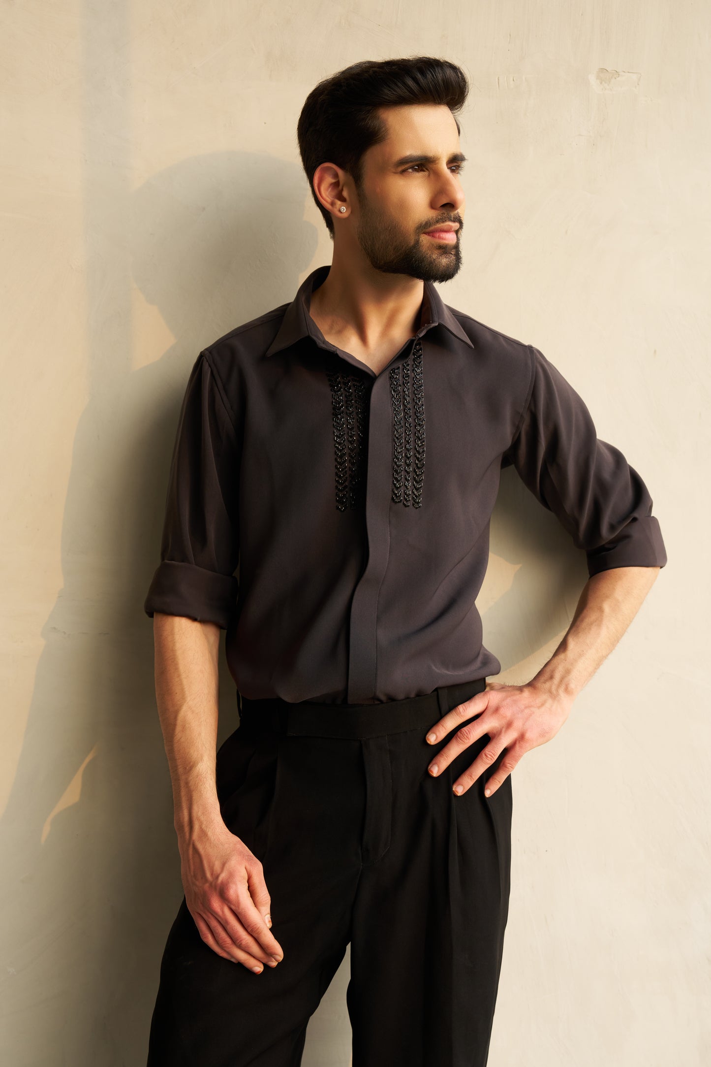 Dark grey shirt with black embellishment design