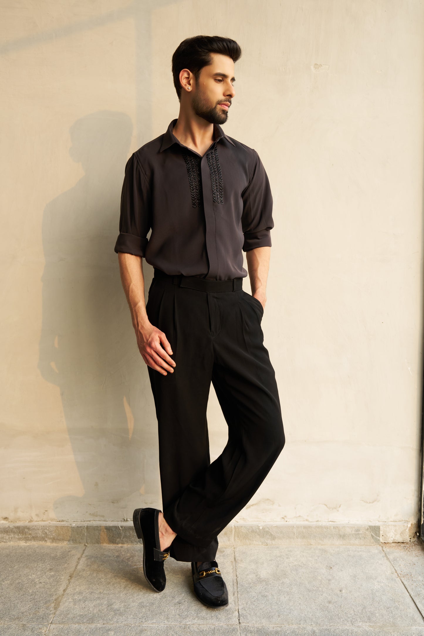 Dark grey shirt with black embellishment design