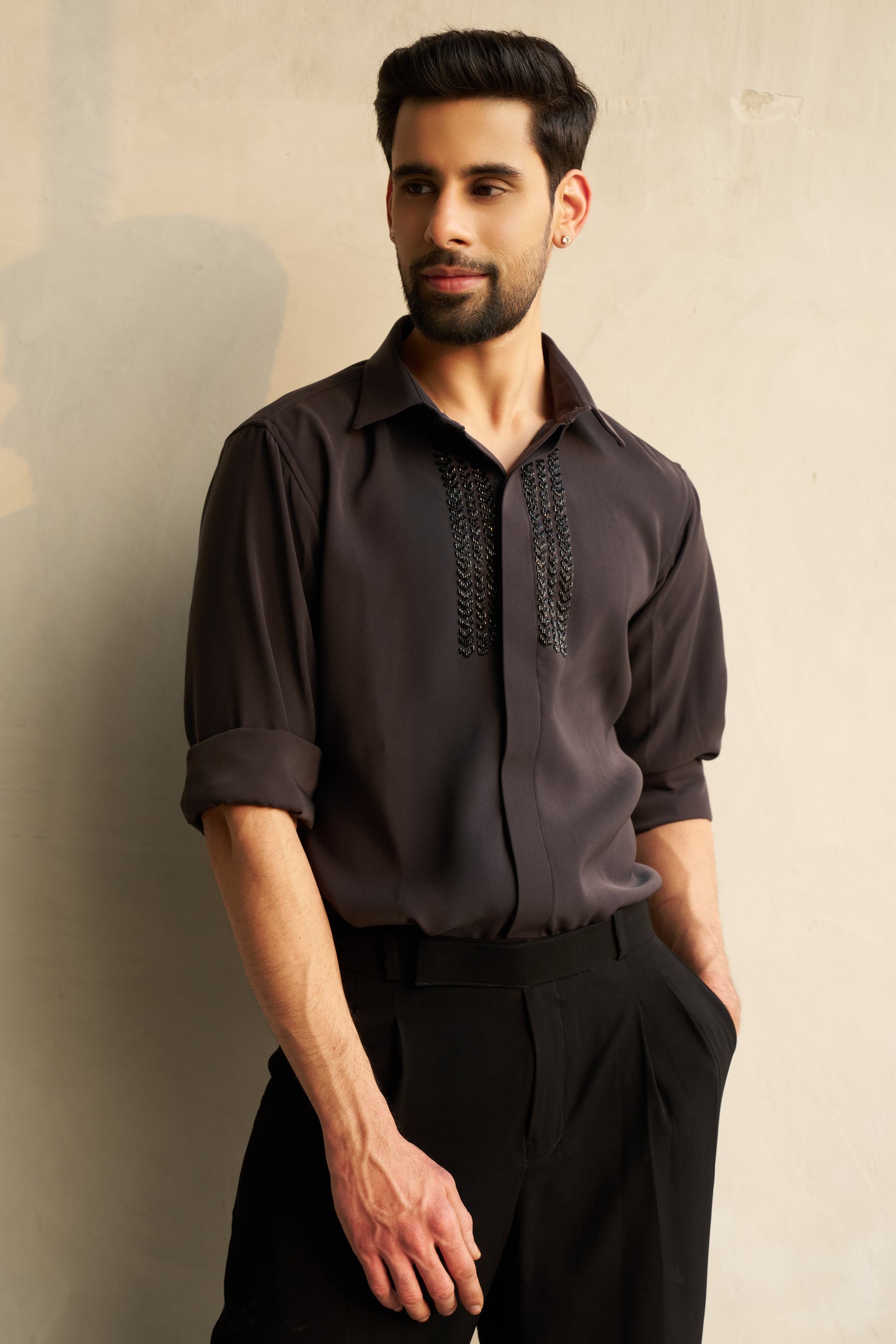 Dark grey shirt with black embellishment design