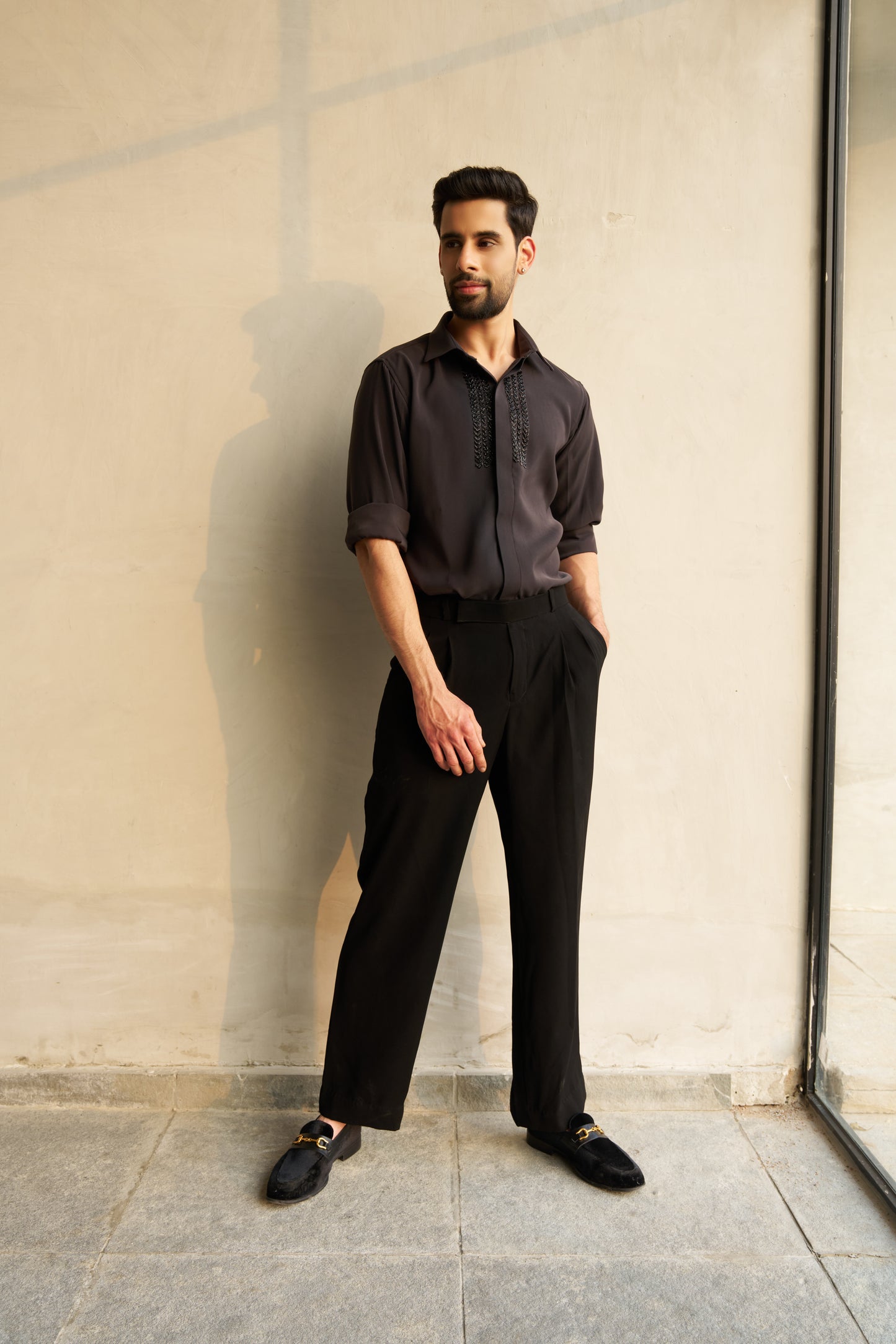 Dark grey shirt with black embellishment design