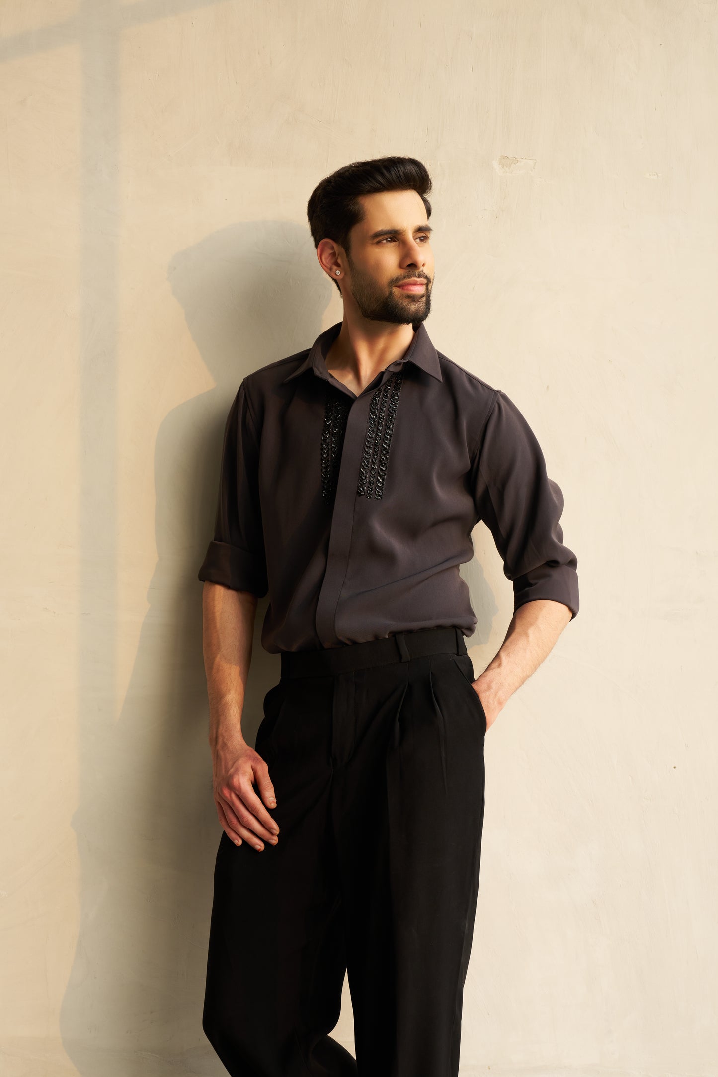 Dark grey shirt with black embellishment design