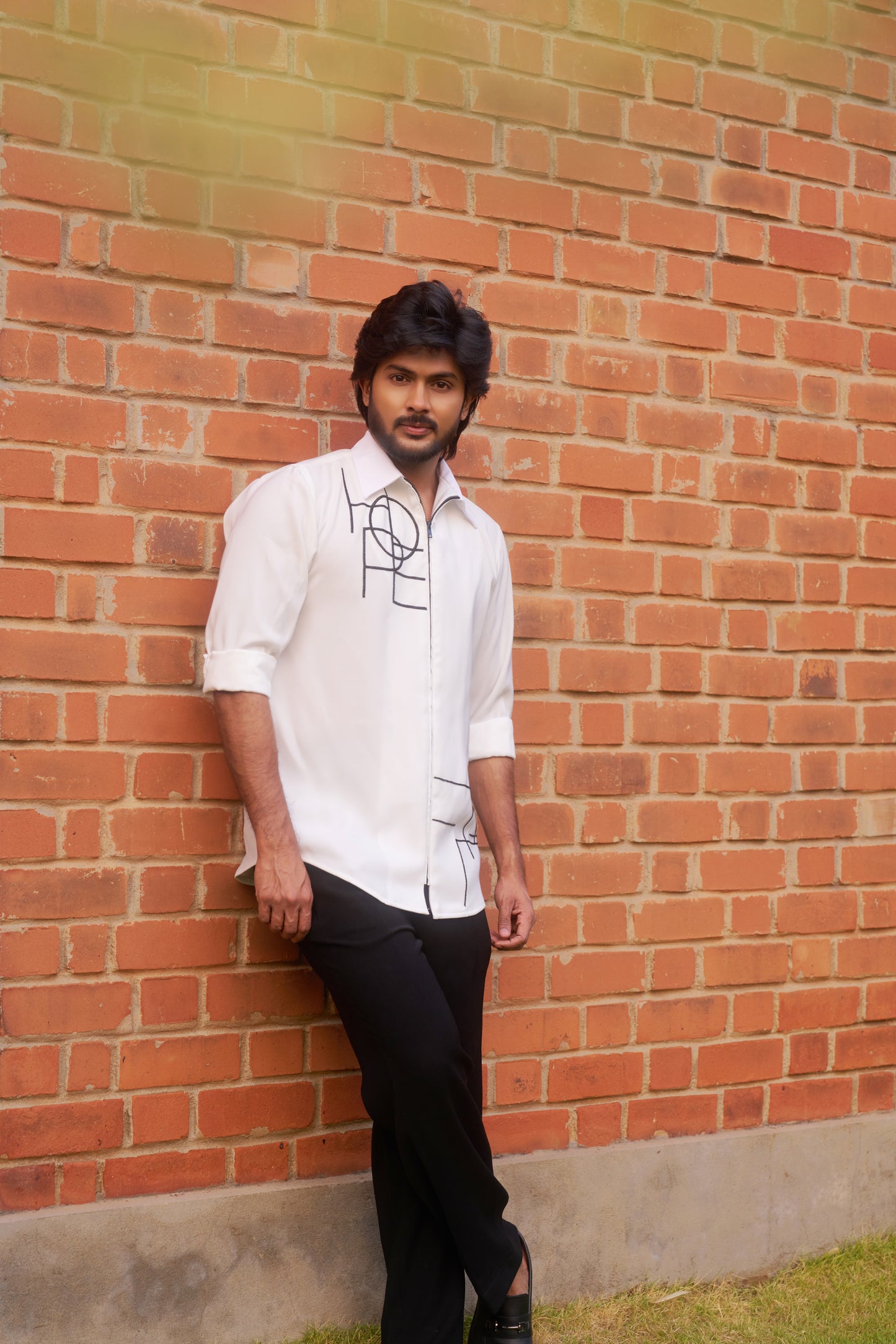 White shirt with Black geometric HOPE design in zipper model