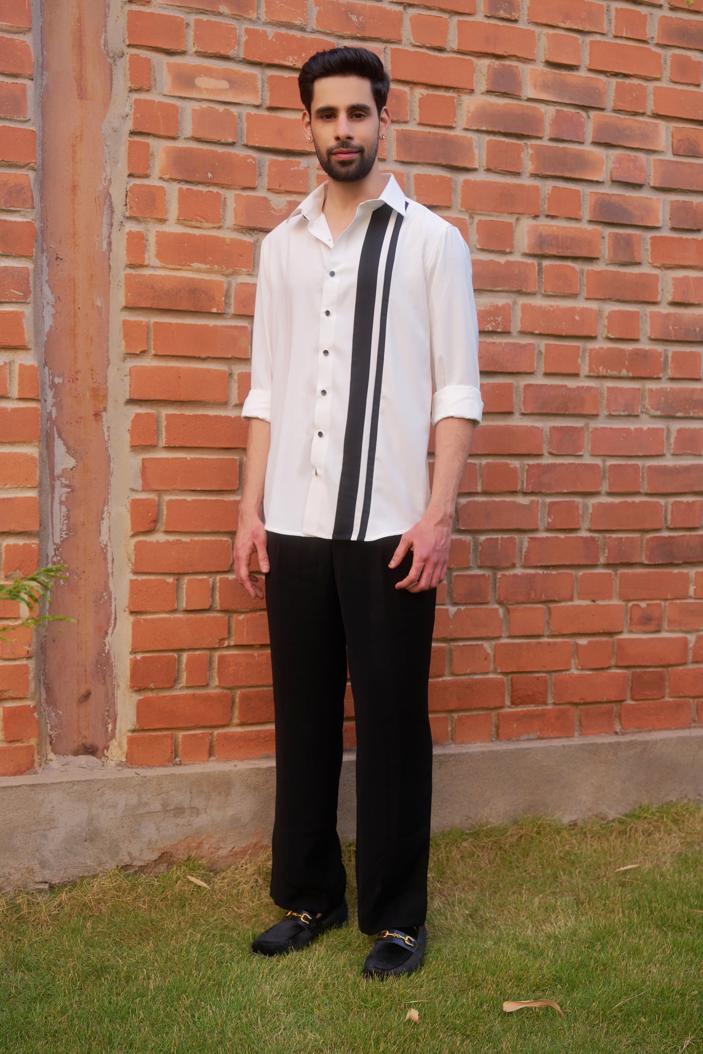White shirt with black vertical stripes design