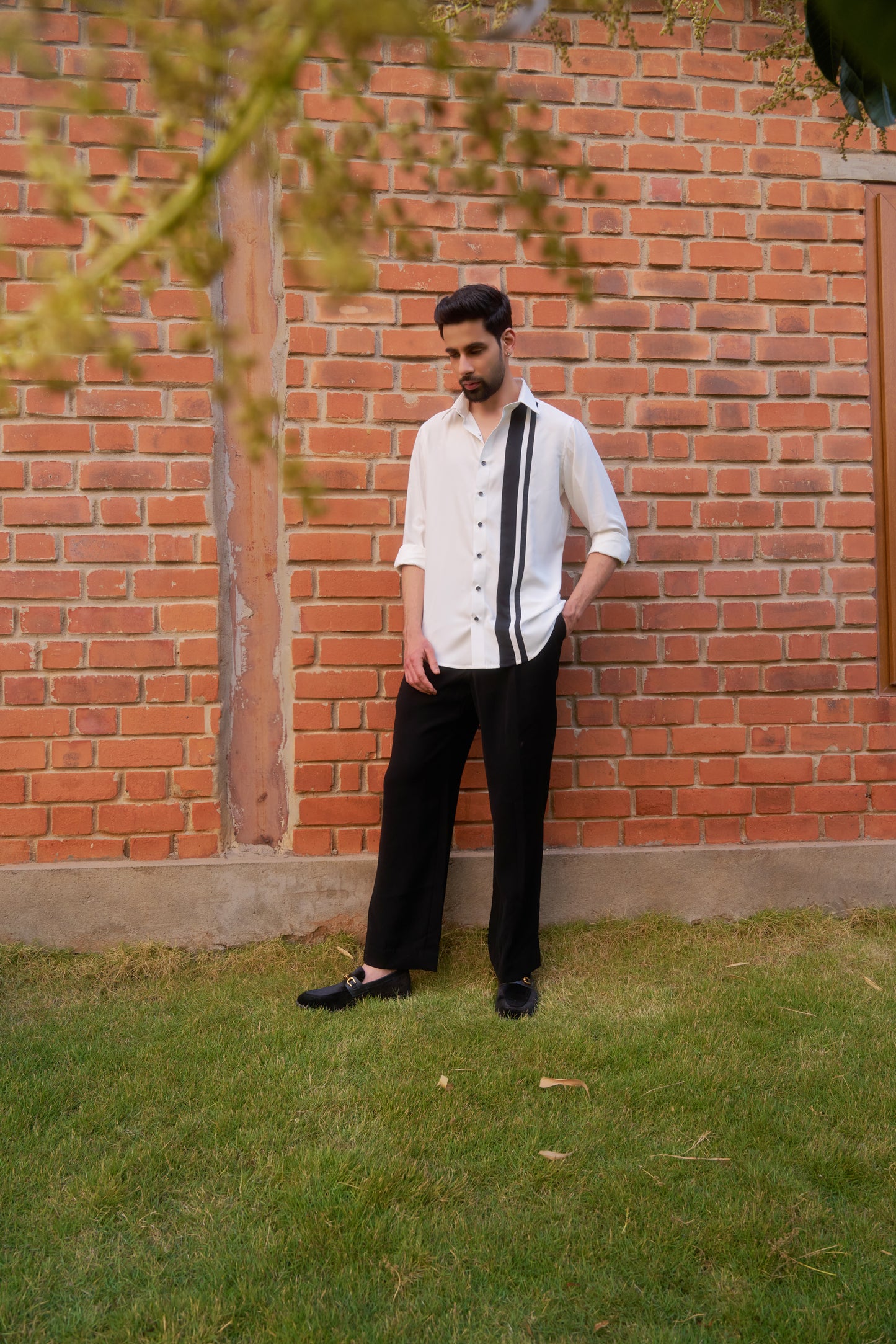 White shirt with black vertical stripes design